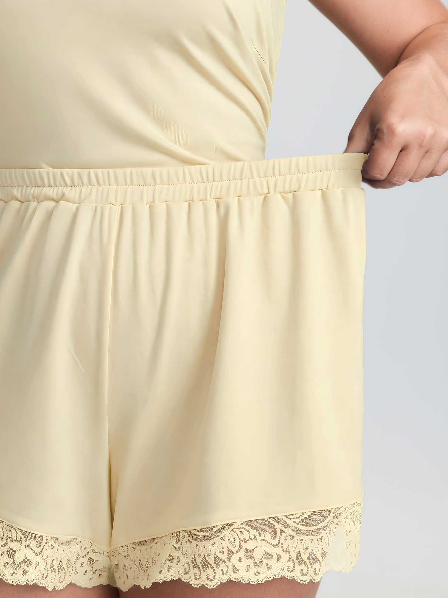 Side view of BloomChic Women's Plus Size Supersoft Lace Trim Two-Piece Pajama Set Apricot not graphics 22-24/3X