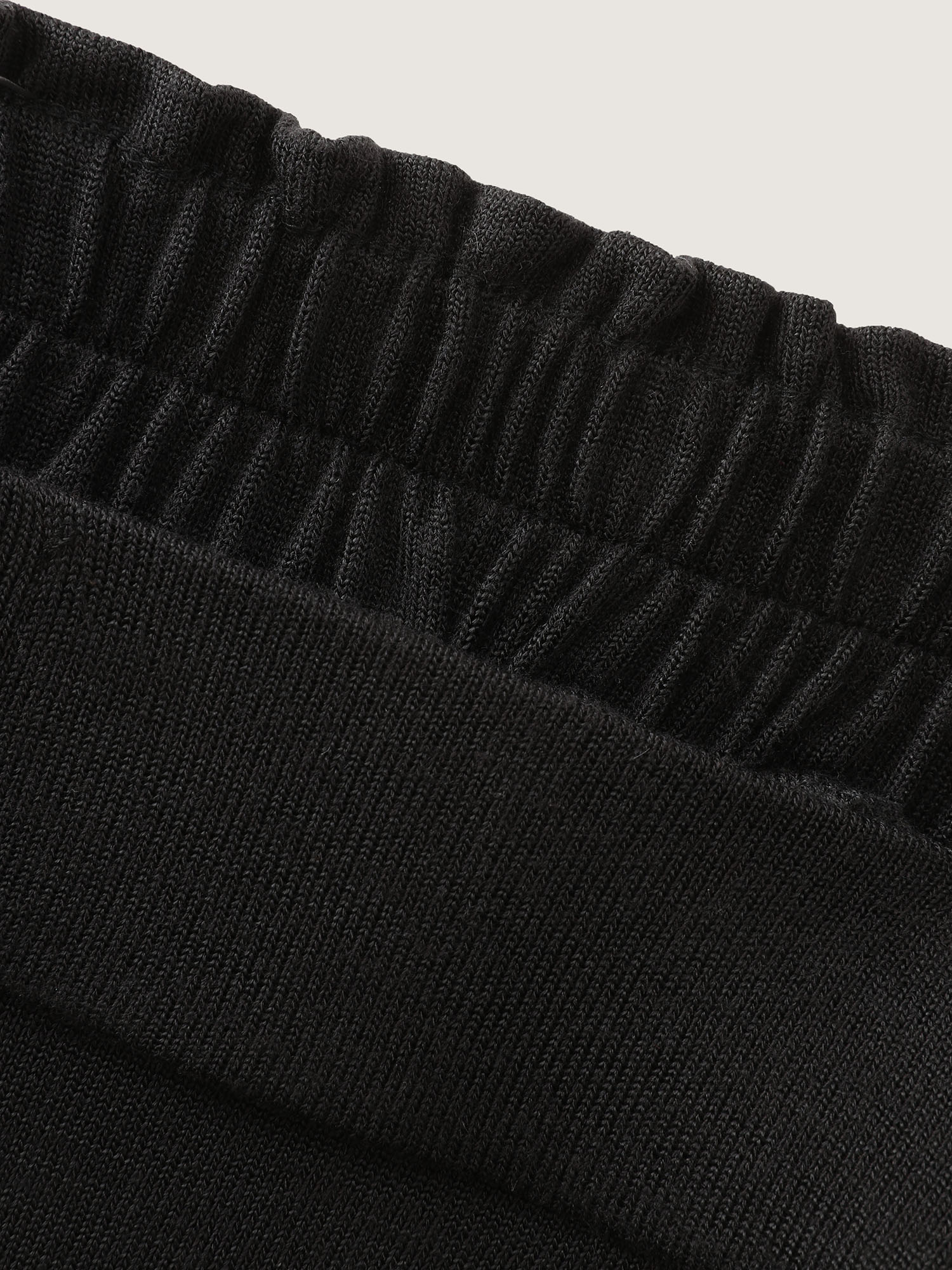 Side view of BloomChic Women's Plus Size Supersoft Elastic Waistband Lounge Bottoms Black Capri 18-20/2X