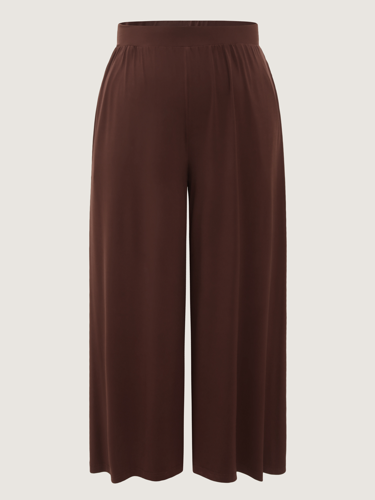 Side view of BloomChic Women's Plus Size Supersoft Stretchy Pleated Flared Plain Pants Browncoffeecolor Solid Flared Mid Rise Elegant 30/6X