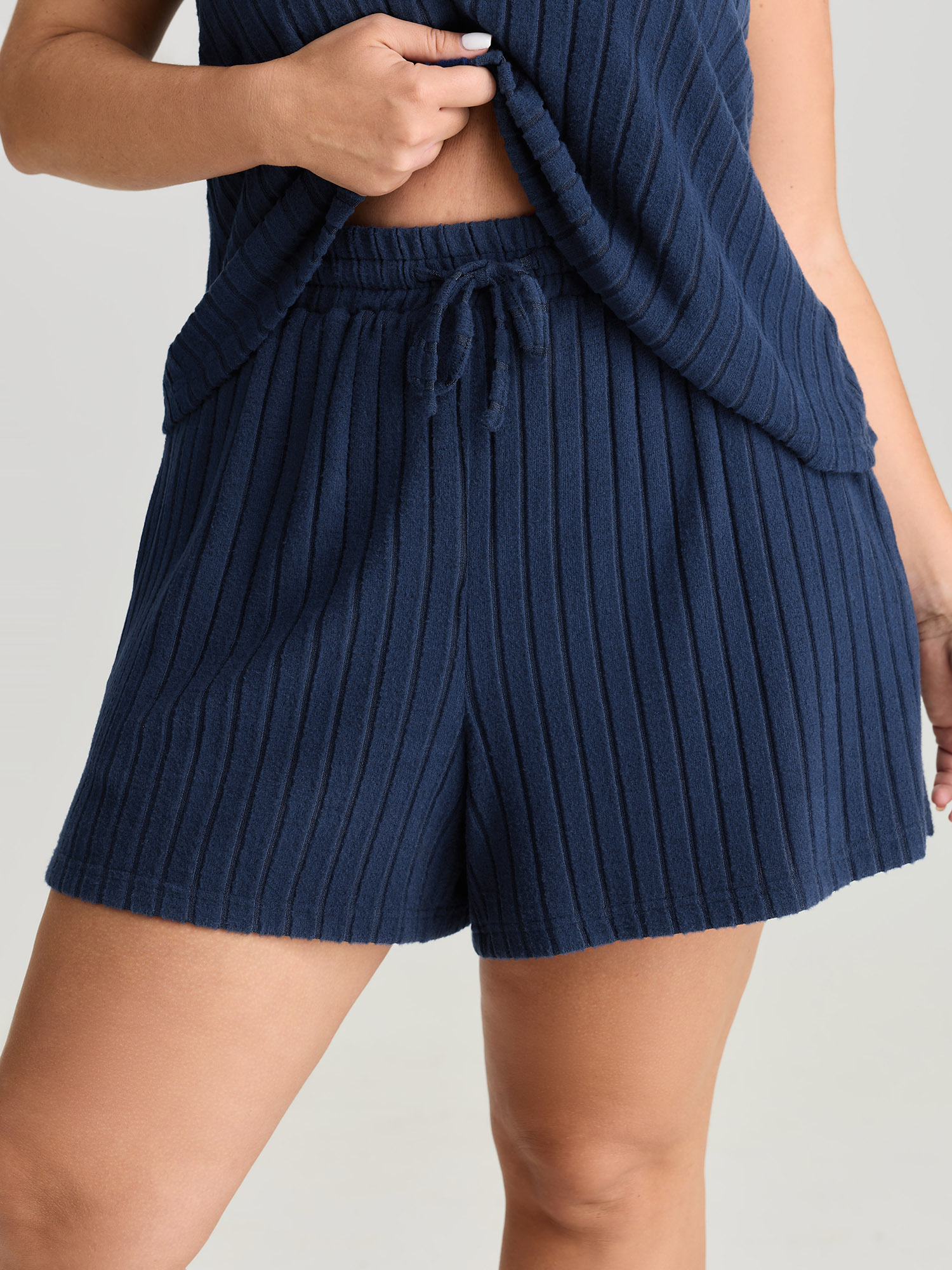Side view of BloomChic Women's Plus Size Textured Stretchy Co-Ord Lounge Set Indigo Solid Sleeveless Non 18-20/2X