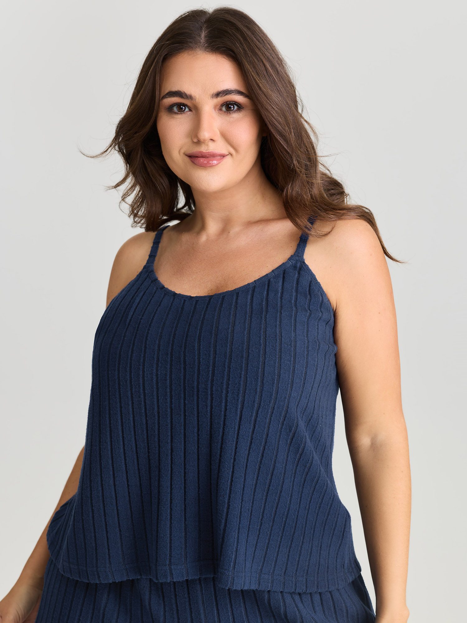 Side view of BloomChic Women's Plus Size Textured Stretchy Co-Ord Lounge Set Indigo Solid Sleeveless Non 18-20/2X