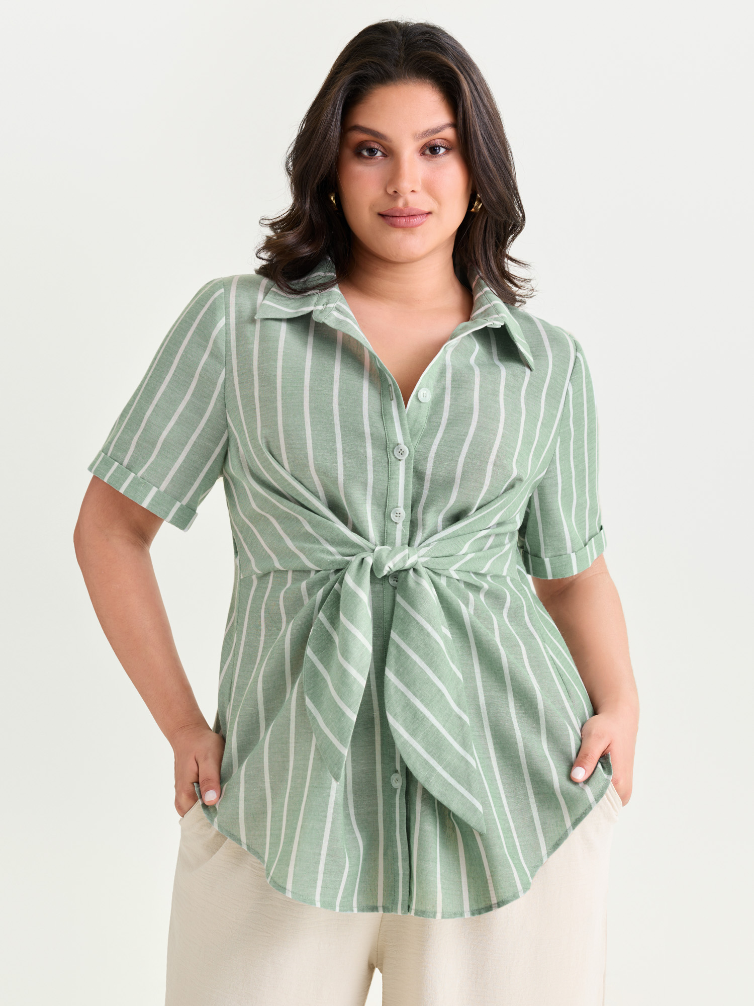 BloomChic Women's Plus Size Striped Knotted Front Asymmetrical Hem Blouse Greenbean Stripes Office Short sleeve Collared Neck 10/M
