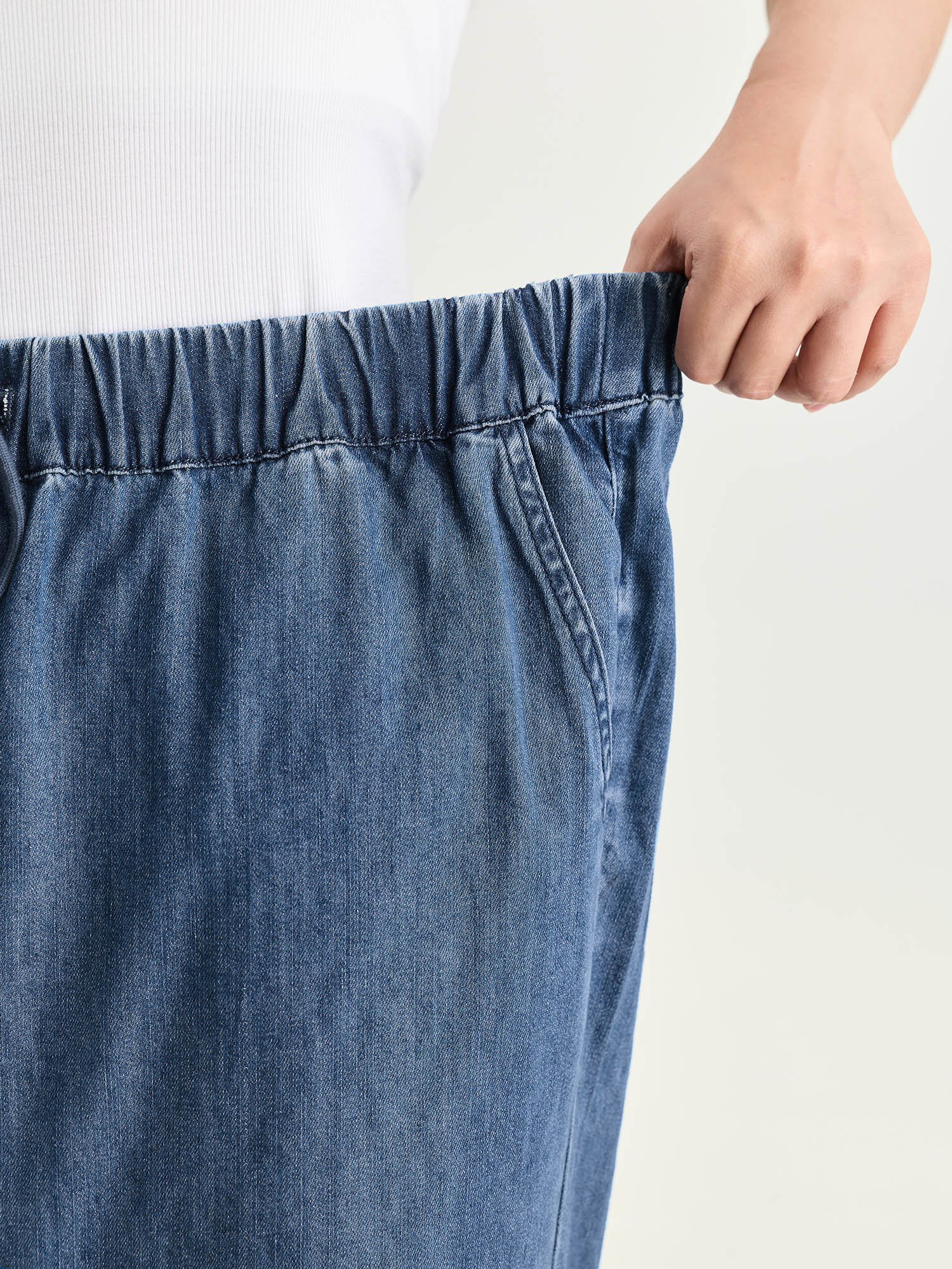 Side view of BloomChic Women's Plus Size Drawstring Waist Wide-Leg Pocket Jeans Midblue Wide leg No stretch 30/6X