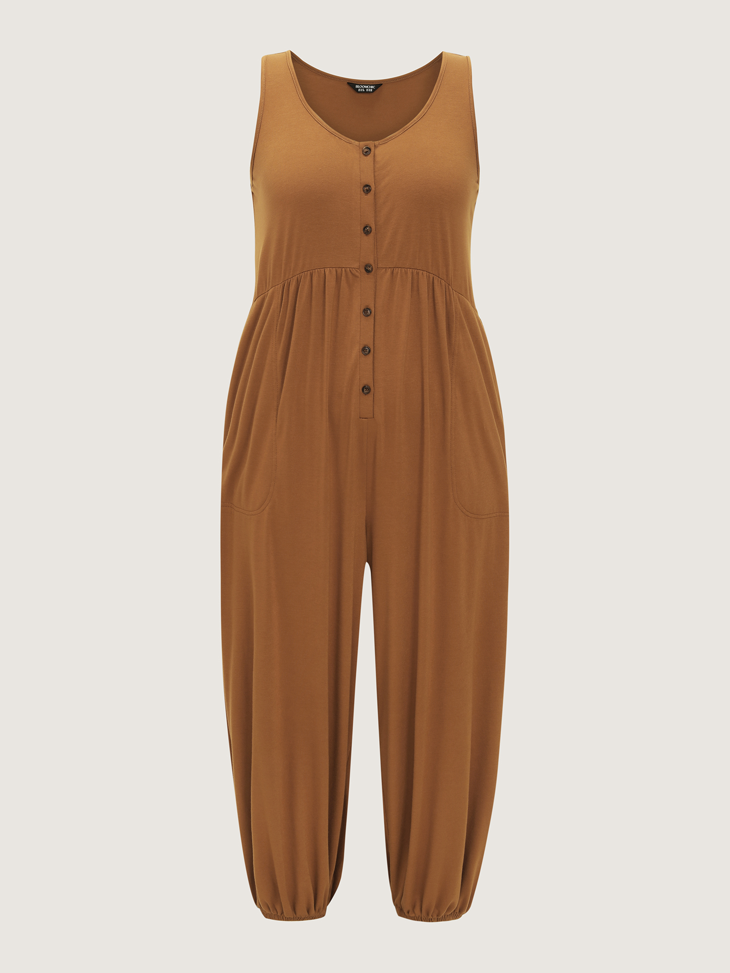 Side view of BloomChic Women's Plus Size Supersoft Buttons Pleated Cuffed Hem Lounge Jumpsuit Yellowishbrown not graphics 28/5X