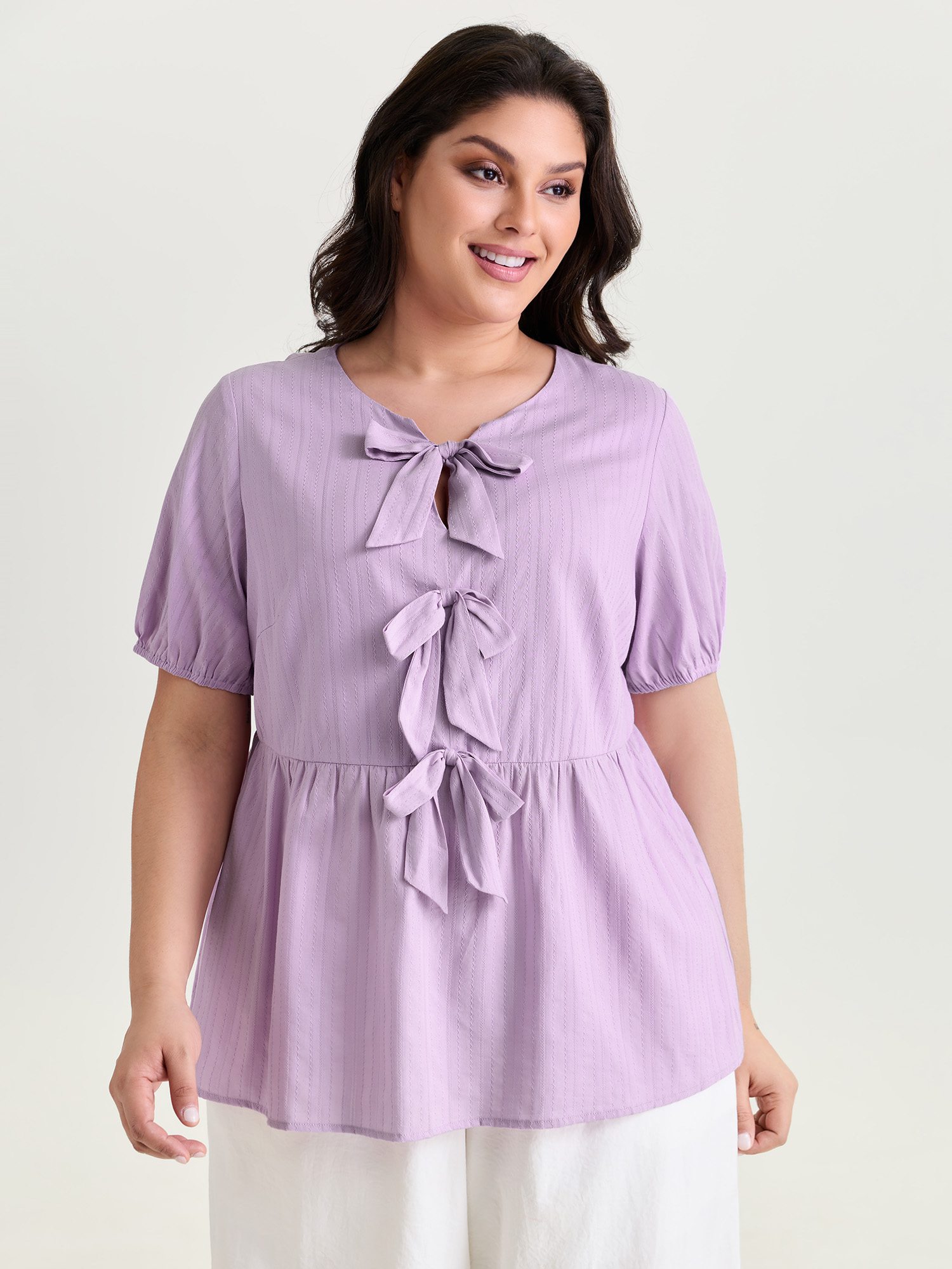 BloomChic Women's Plus Size Texture Bow-Front Detail Plain Blouse Lilac Solid Everyday-Casual Short sleeve V-Notch Neck 10/M