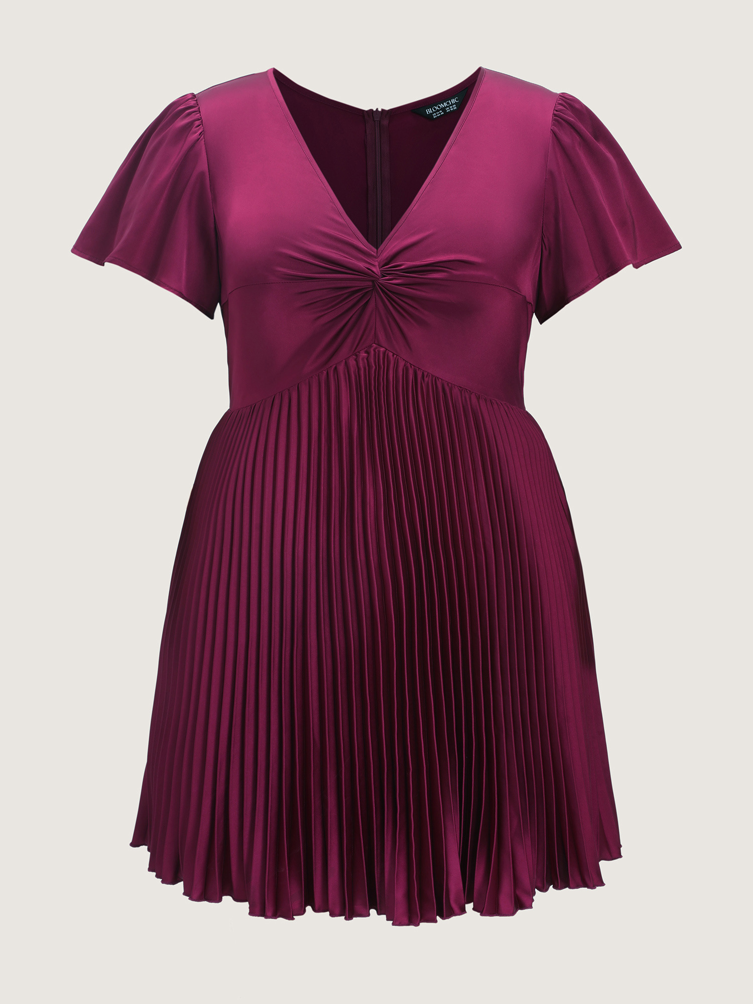 Side view of BloomChic Women's Plus Size Ruched Pleated Skirt Built-In Shorts Mini Dress Deeppurplered Party Knee Length Twist V-Neck 28/5X