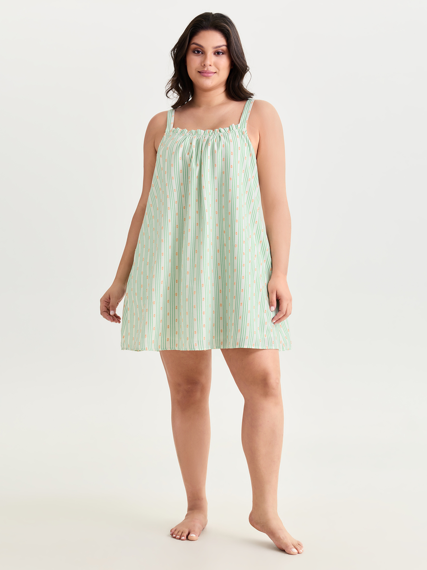 Side view of BloomChic Women's Plus Size Striped Print Relaxed-Fit Lounge Dress Turquoise not graphics Mini 14-16/1X