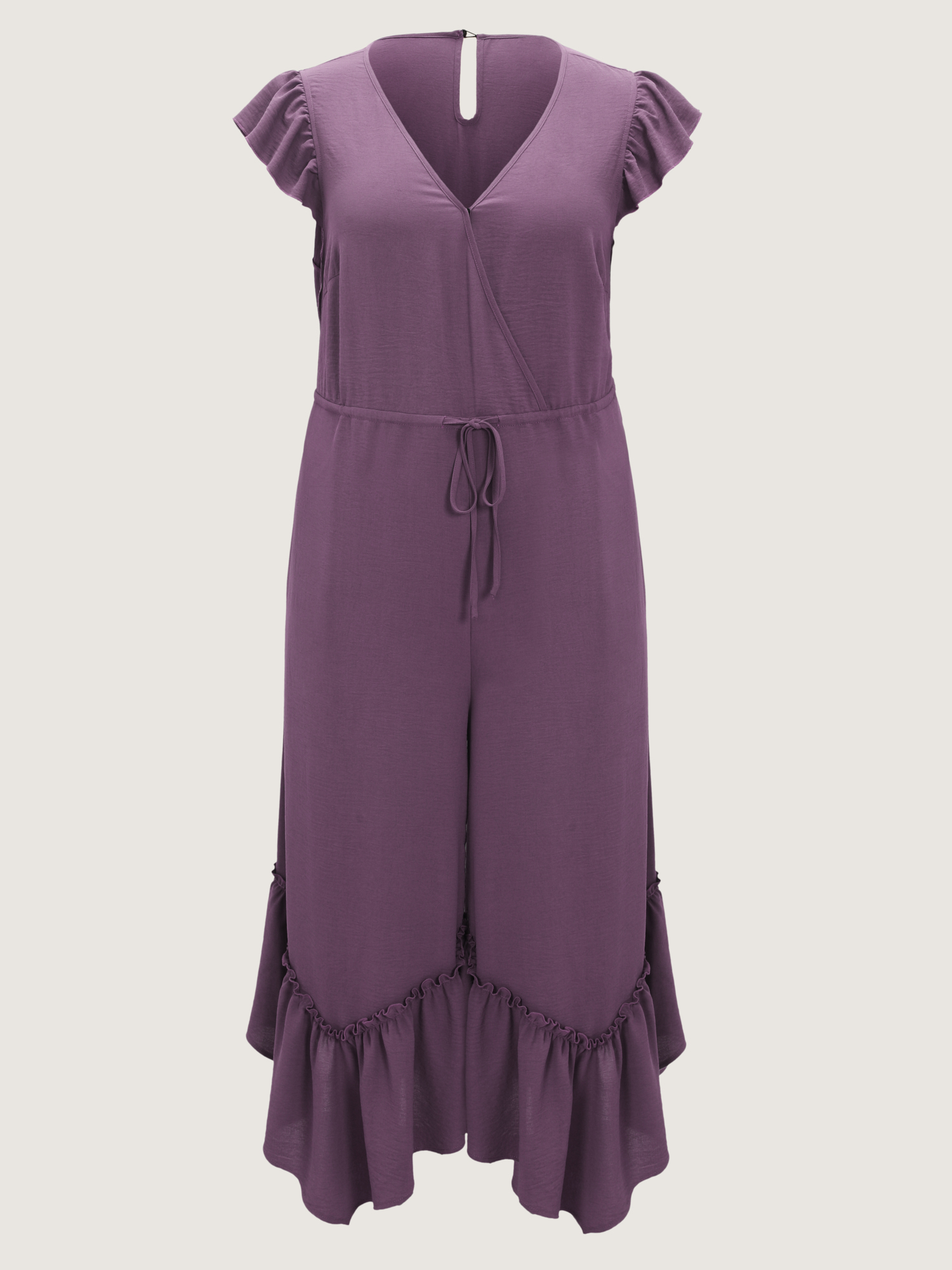 Side view of BloomChic Women's Plus Size Ruffled Drawstring Waist Flowy Jumpsuit Mauve Vacation 10/M