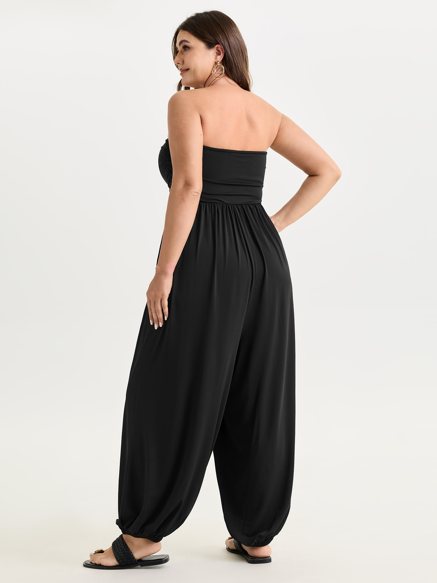 Side view of BloomChic Women's Plus Size Supported Bra Off-Shoulder Stretchy Pockets Jumpsuit Black Vacation 14-16/1X