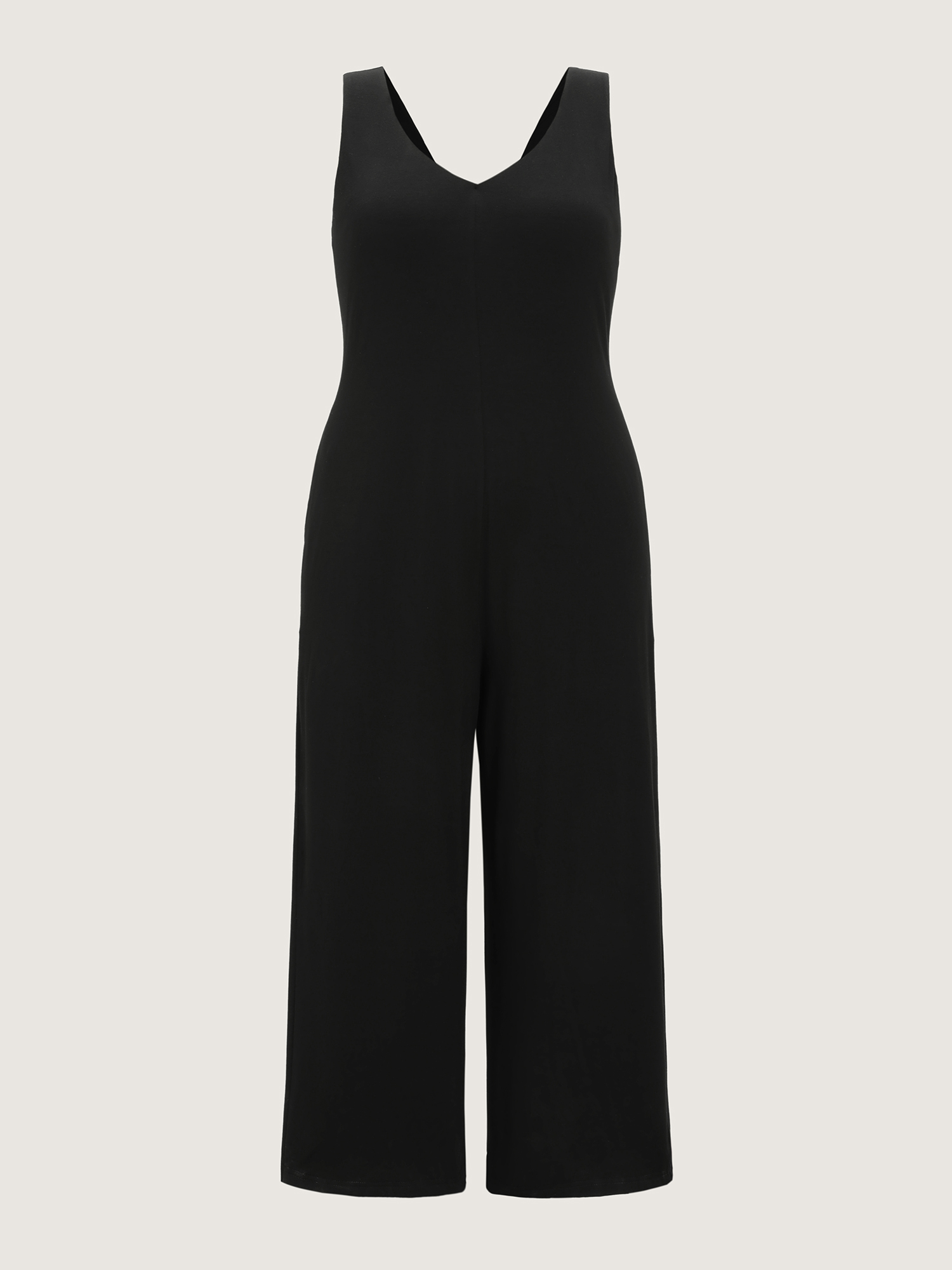 Side view of BloomChic Women's Plus Size Stretchy Deep Back Neckline Jumpsuit Black Casual 30/6X