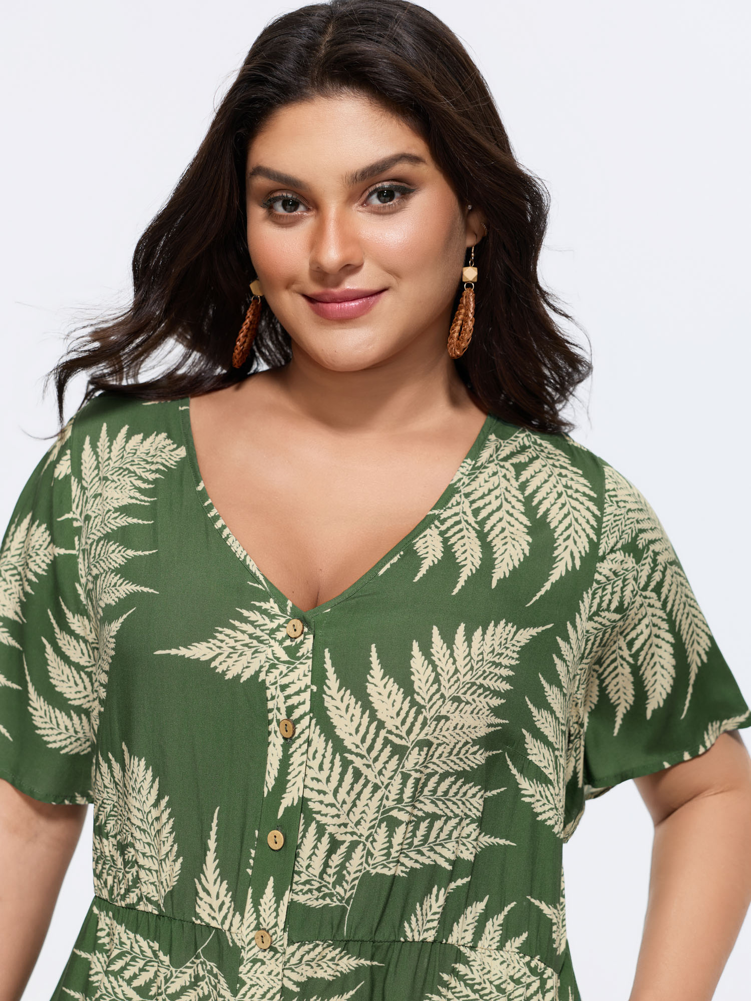 Side view of BloomChic Women's Plus Size Tropical Leaf Print Pockets Button Romper Moss not graphics Vacation No stretch 28/5X