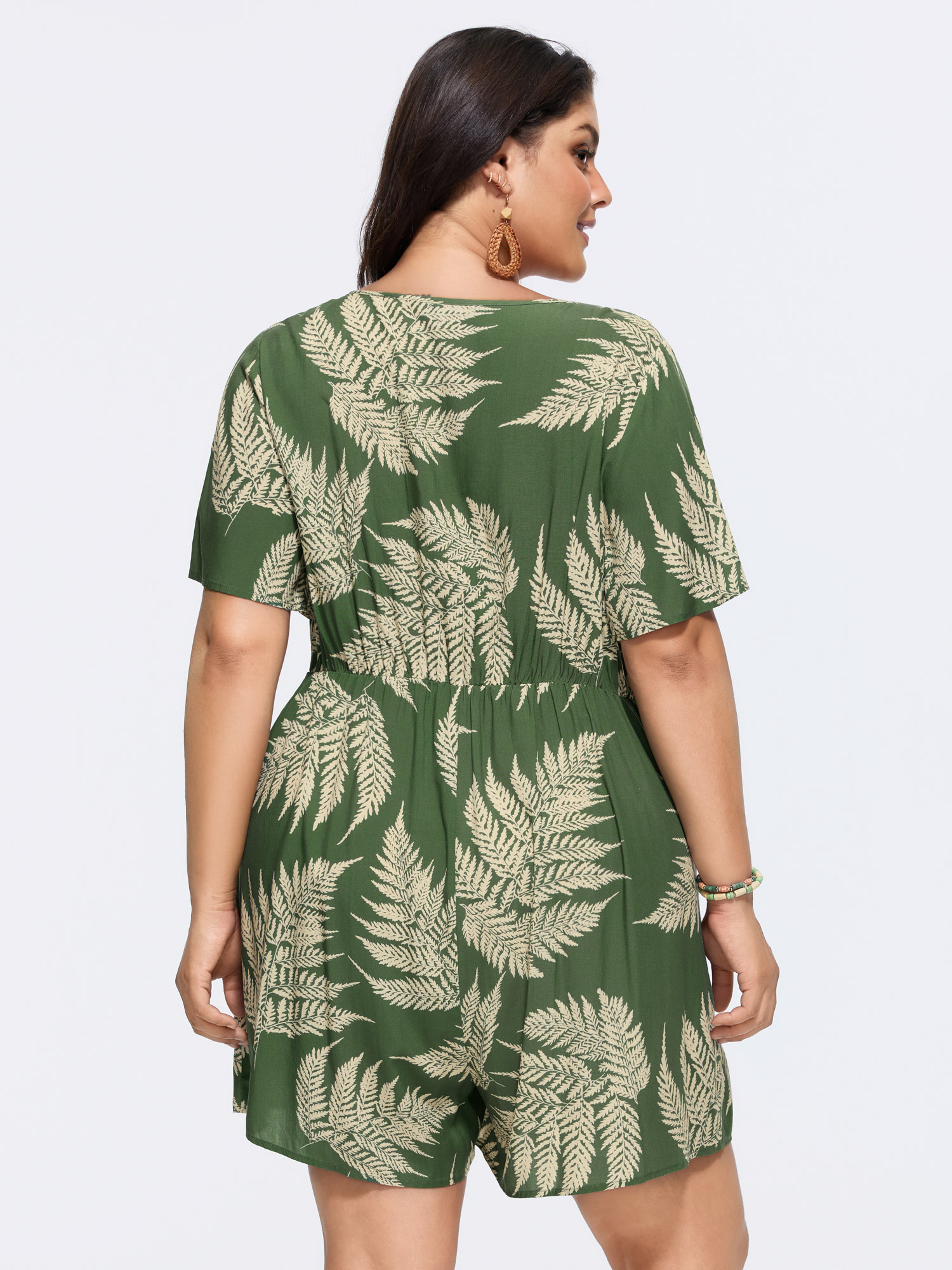 Side view of BloomChic Women's Plus Size Tropical Leaf Print Pockets Button Romper Moss not graphics Vacation No stretch 28/5X