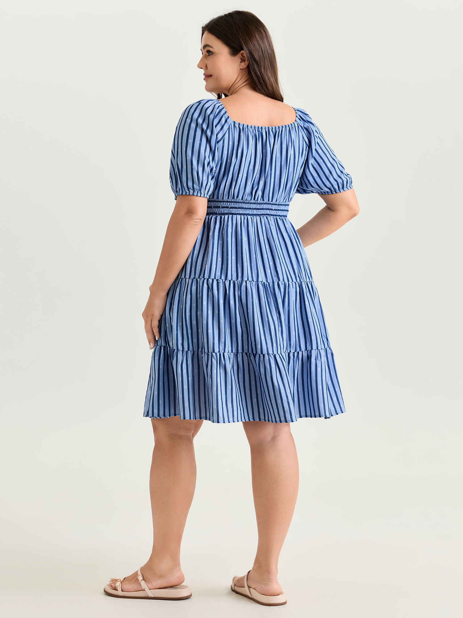 Side view of BloomChic Women's Plus Size Striped Print Neck-Tie Tiered Mini Dress Skyblue Stripes Knee Length Casual Smocked 30/6X