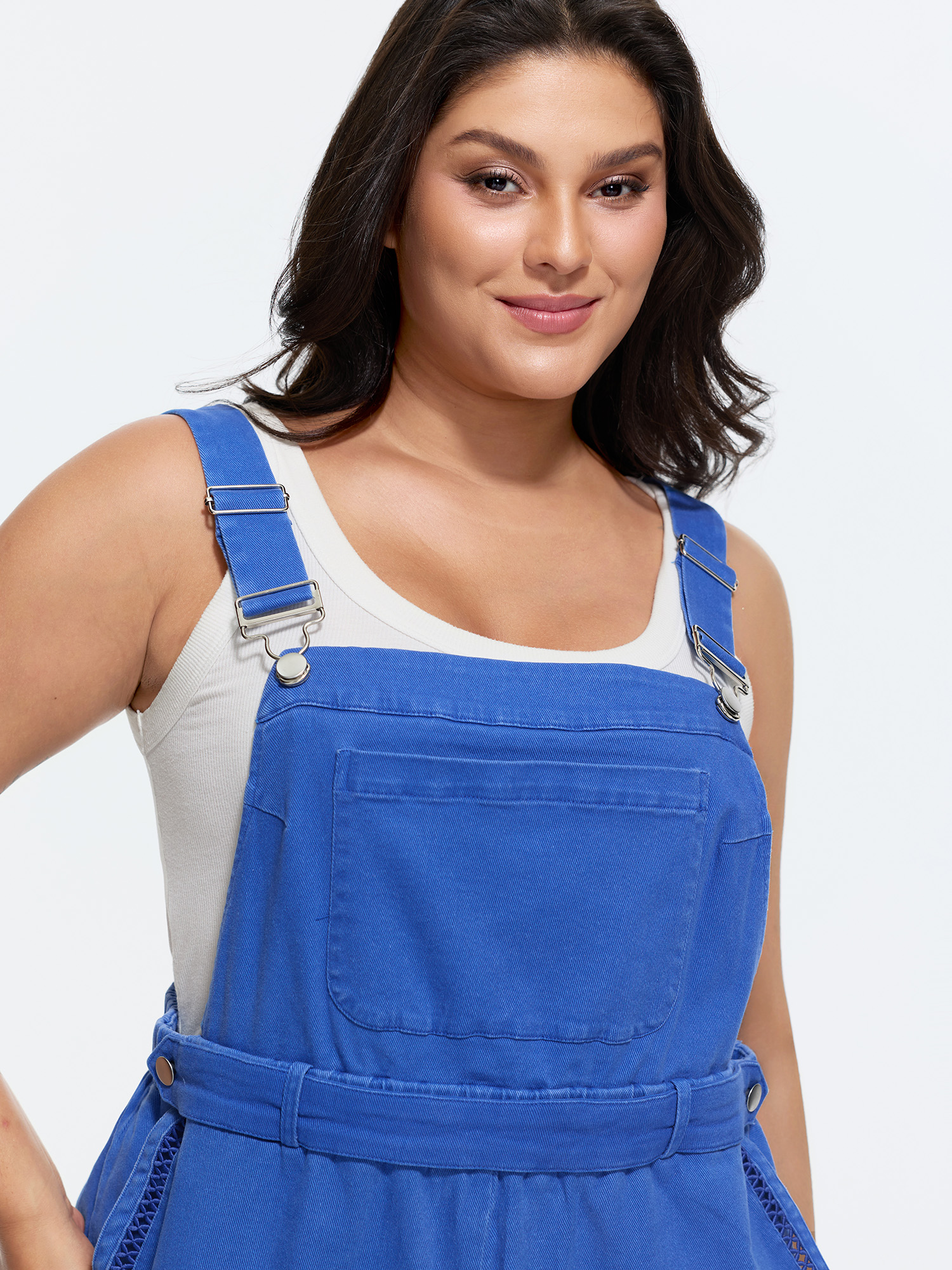 Side view of BloomChic Women's Plus Size Cotton Overall Pockets Folded Hem Romper Brightblue Casual 12/L