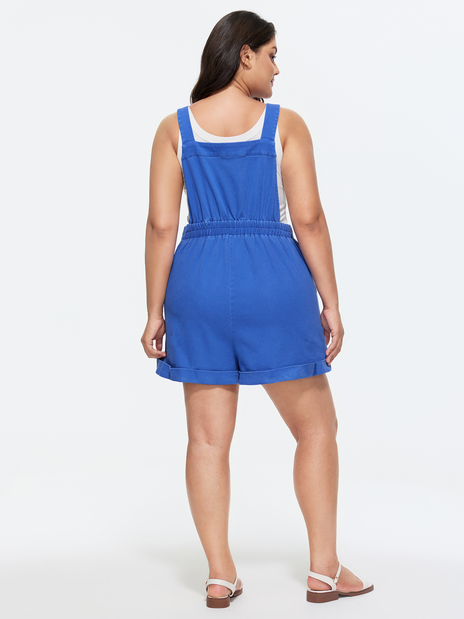 Side view of BloomChic Women's Plus Size Cotton Overall Pockets Folded Hem Romper Brightblue Casual 12/L