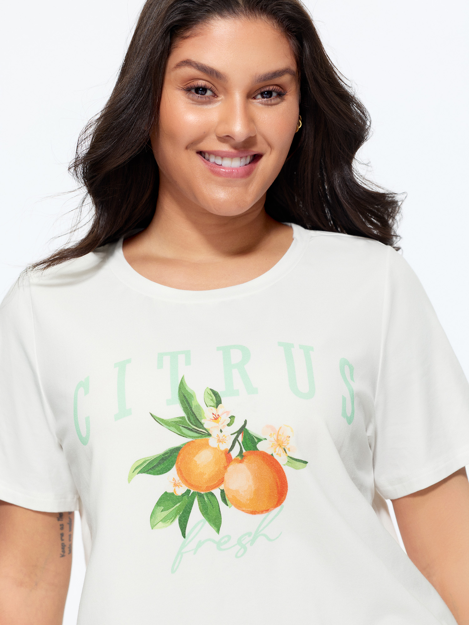 Side view of BloomChic Women's Plus Size Citrus Print Stretchy Lounge Set Greenbean Fruit Short sleeve Smocked 26/4X