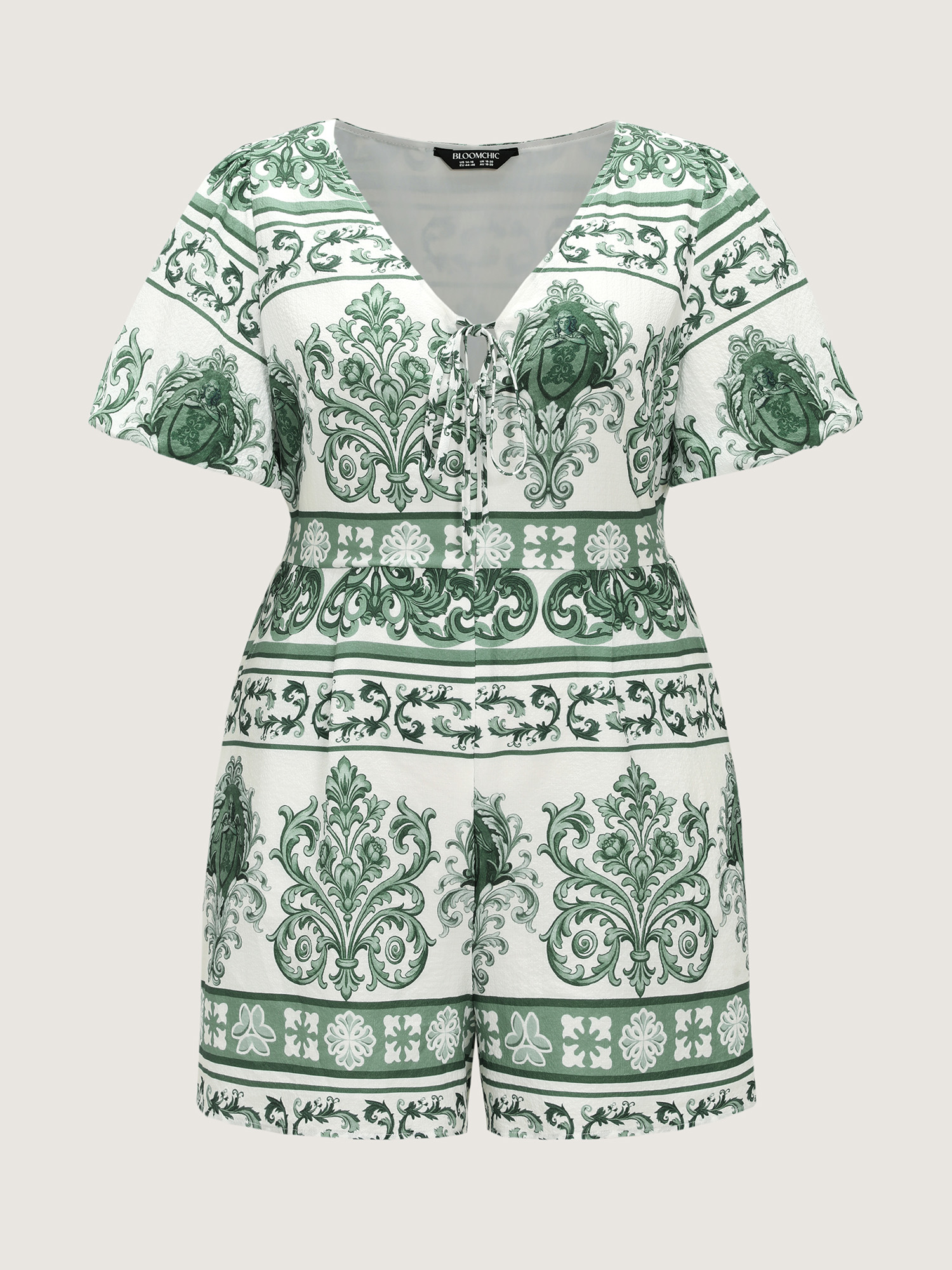 Side view of BloomChic Women's Plus Size Paisley Print Pockets Wide-Leg Romper Teal Elegant Fitted 18-20/2X