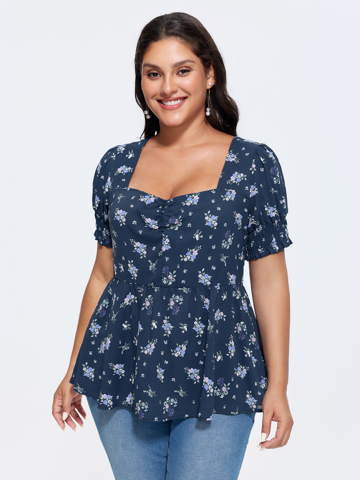 Side view of BloomChic Women's Plus Size Floral Print Ruched Fit And Flare Blouse DarkBlue Ditsy Floral Elegant Short sleeve Sweetheart Neck 30/6X