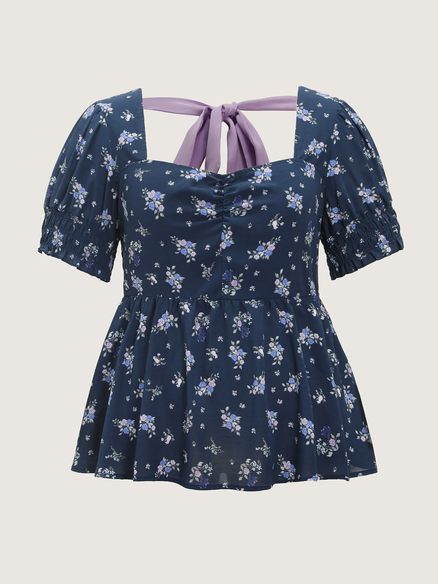 Side view of BloomChic Women's Plus Size Floral Print Ruched Fit And Flare Blouse DarkBlue Ditsy Floral Elegant Short sleeve Sweetheart Neck 30/6X