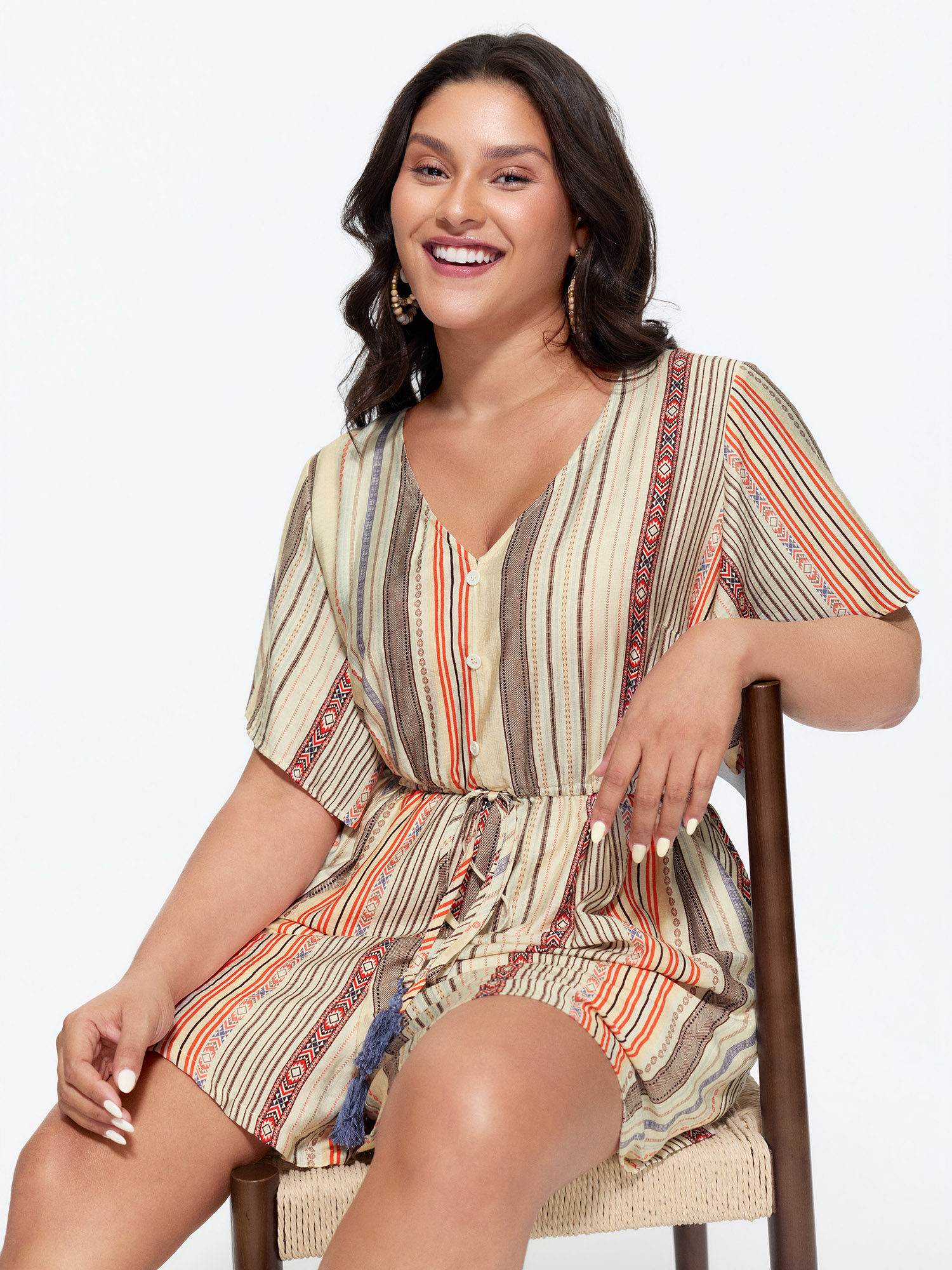 Side view of BloomChic Women's Plus Size Colorful Striped Print Waist-Tie Romper Multicolor Vacation 22-24/3X