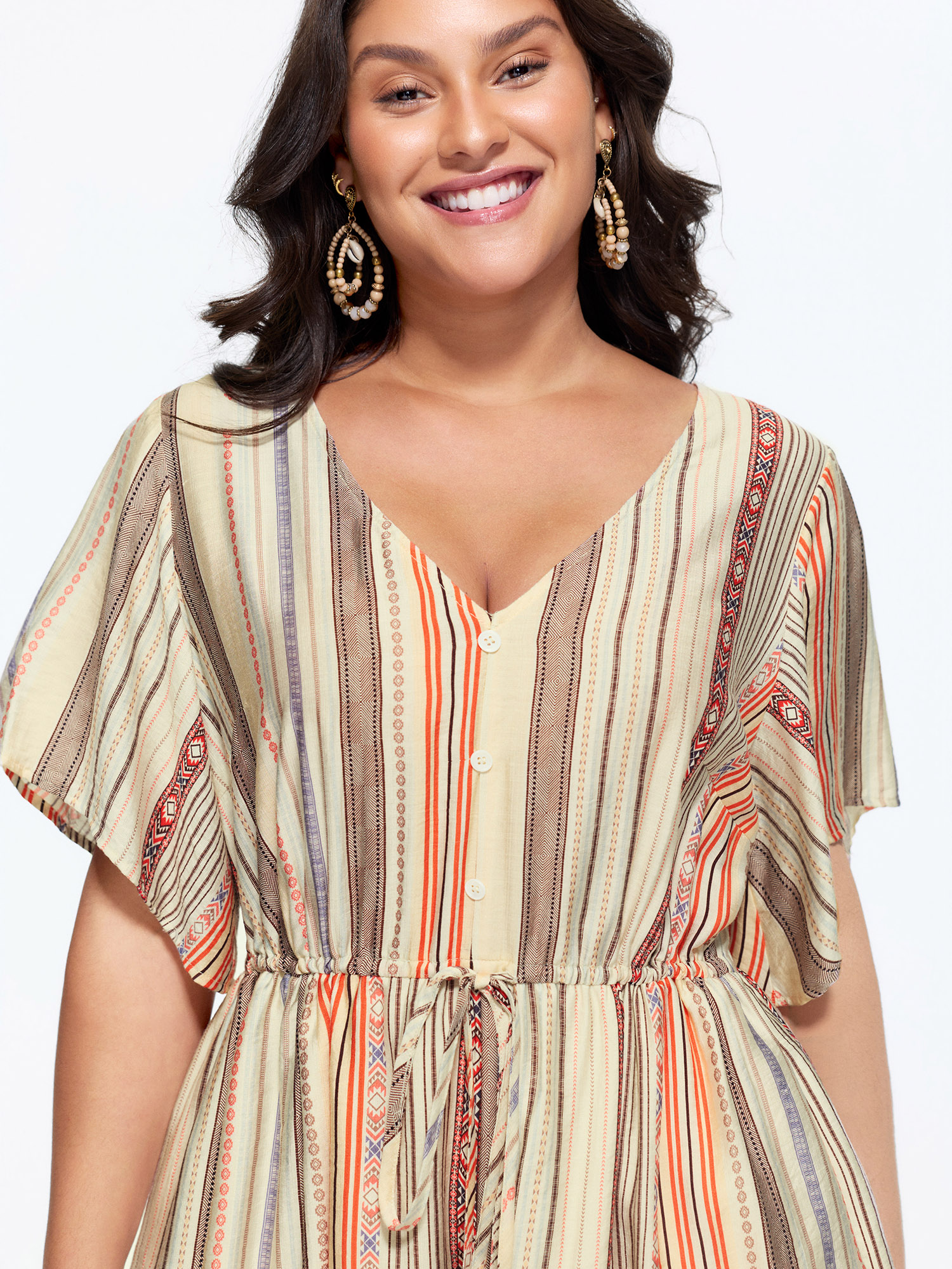 Side view of BloomChic Women's Plus Size Colorful Striped Print Waist-Tie Romper Multicolor Vacation 22-24/3X