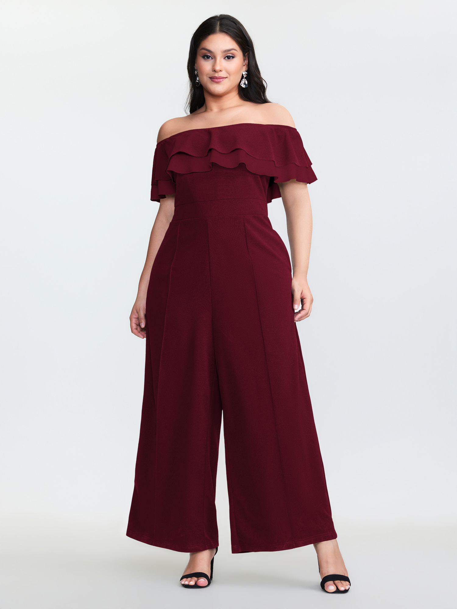 Side view of BloomChic Women's Plus Size Off-Shoulder Lotus Leaf Neckline Jumpsuit Deepred Elegant Fitted 22-24/3X
