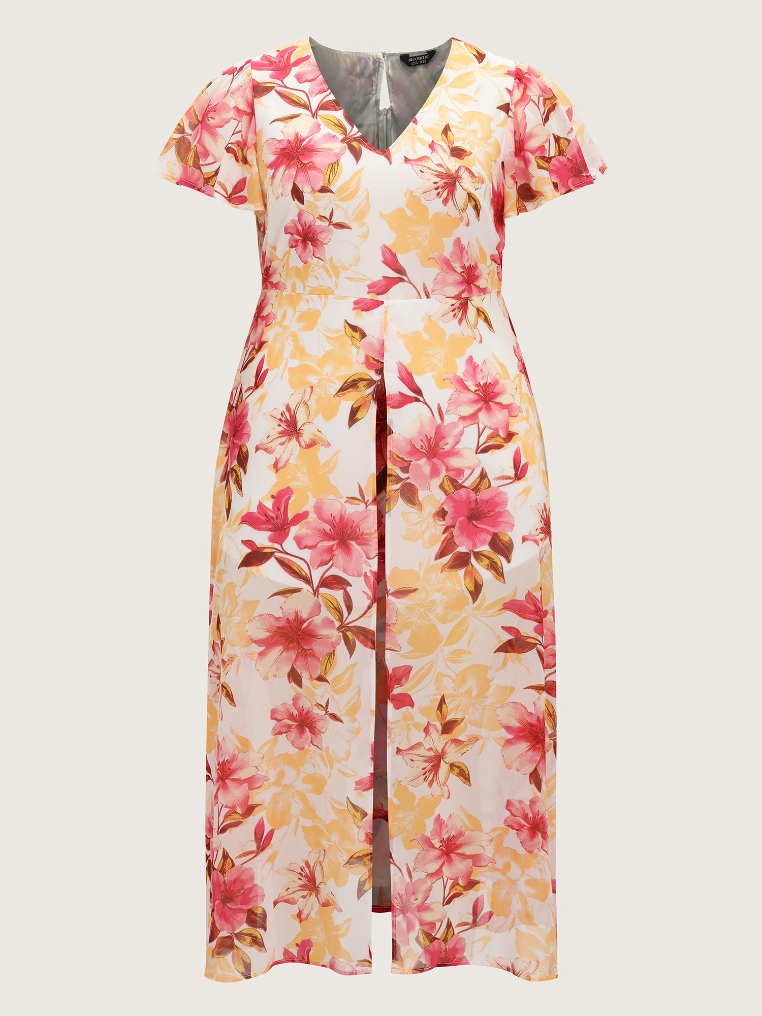 Side view of BloomChic Women's Plus Size Floral Print Stretchy Layered Jumpsuit MistyRose Elegant Fitted 28/5X