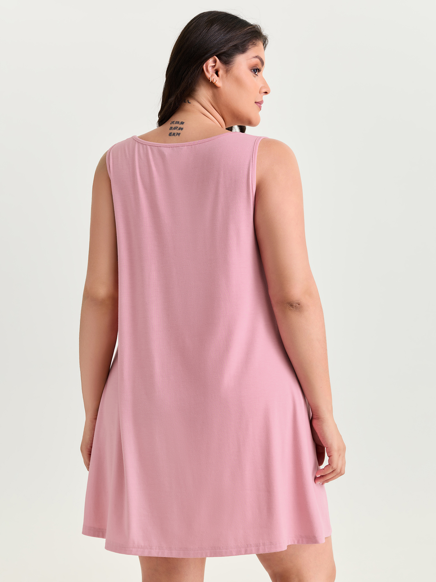 Side view of BloomChic Women's Plus Size Supersoft Stretchy Pleated Flowy Lounge Dress Blush cropped 14-16/1X