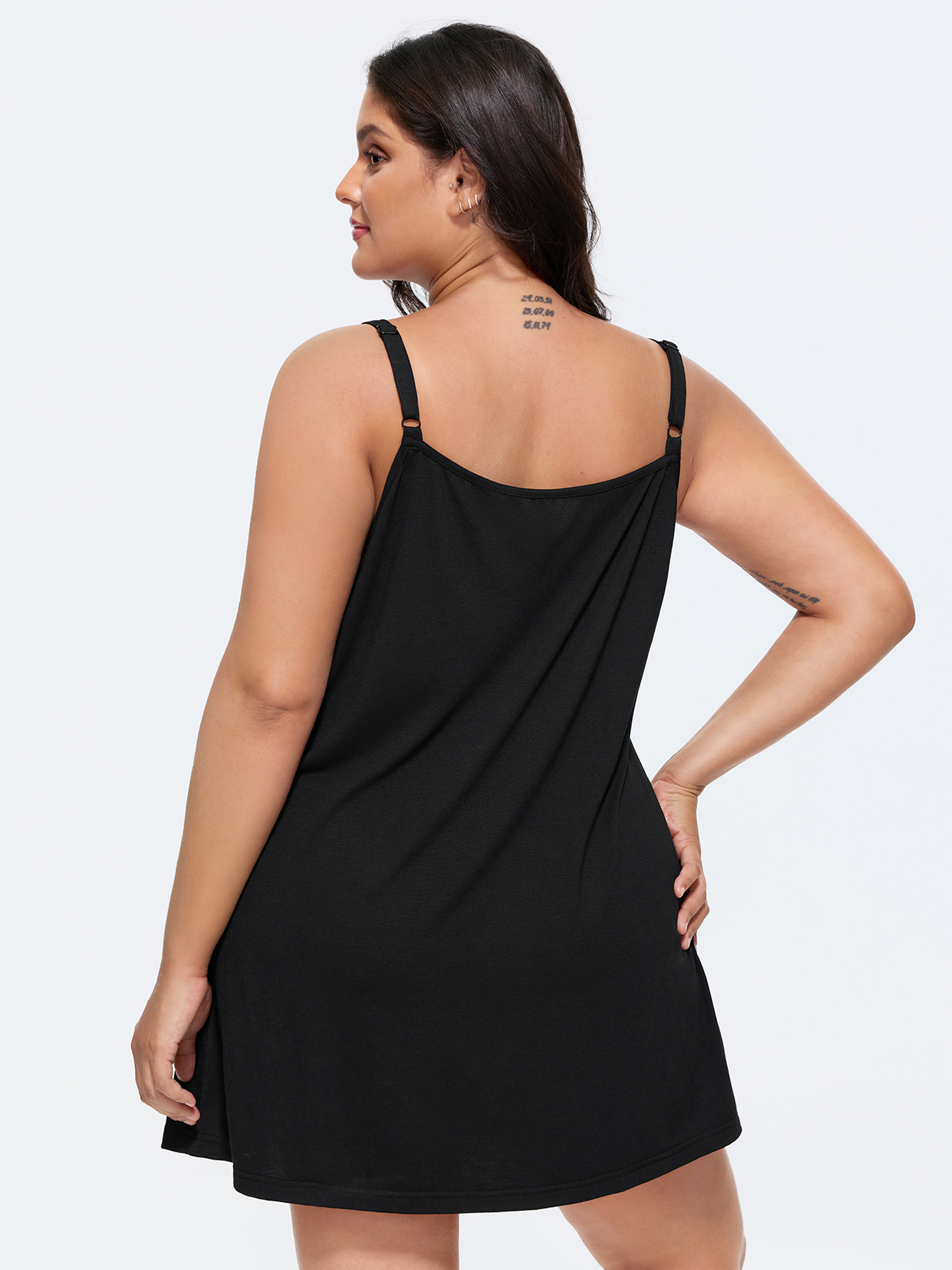 Side view of BloomChic Women's Plus Size Supersoft Pleated Knotted Flowy Lounge Dress Black Knee Length 10/M