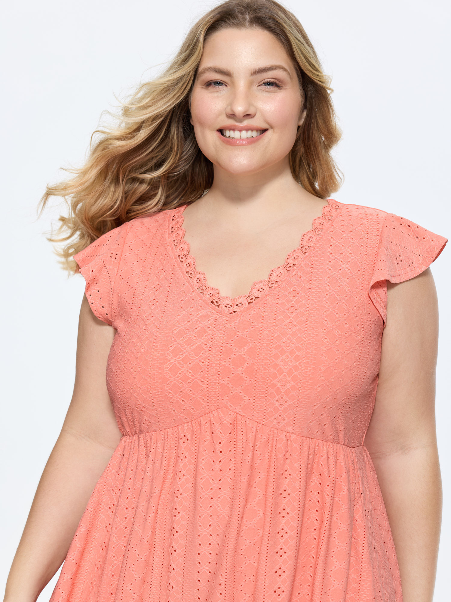 Side view of BloomChic Women's Plus Size Eyelet Textured Flutter Sleeve Mini Dress Crepe Solid Knee Length Casual Lace Trim 30/6X