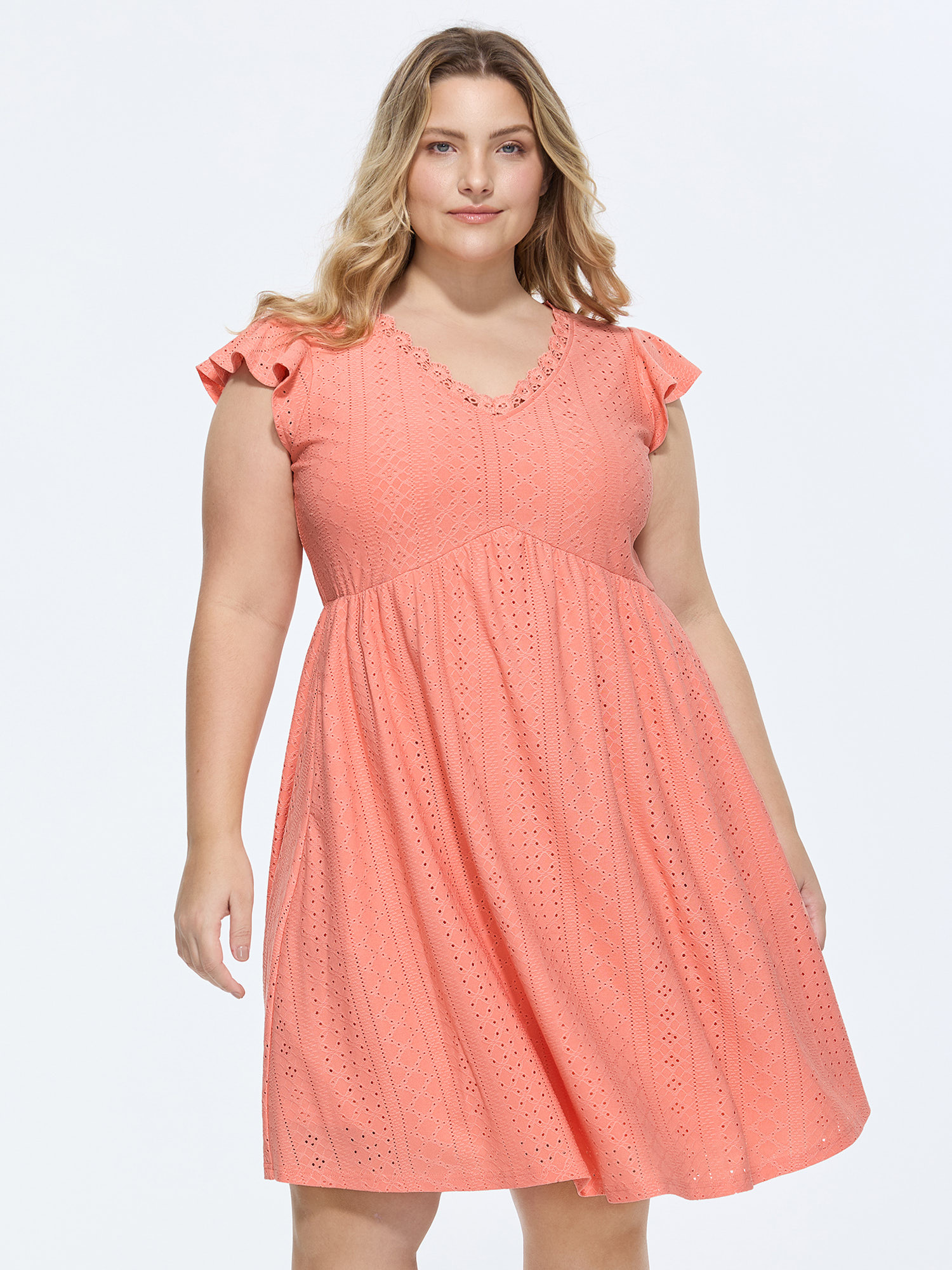 Side view of BloomChic Women's Plus Size Eyelet Textured Flutter Sleeve Mini Dress Crepe Solid Knee Length Casual Lace Trim 30/6X