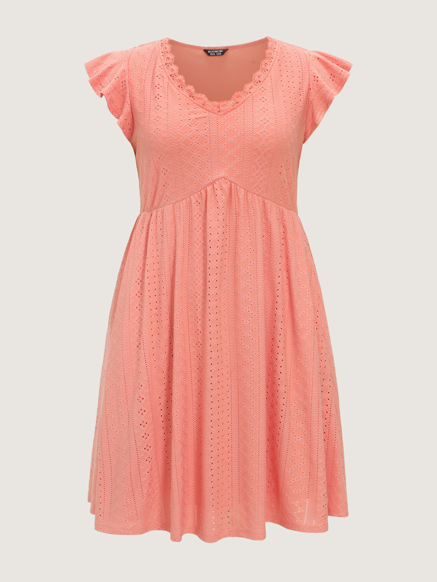 Side view of BloomChic Women's Plus Size Eyelet Textured Flutter Sleeve Mini Dress Crepe Solid Knee Length Casual Lace Trim 30/6X