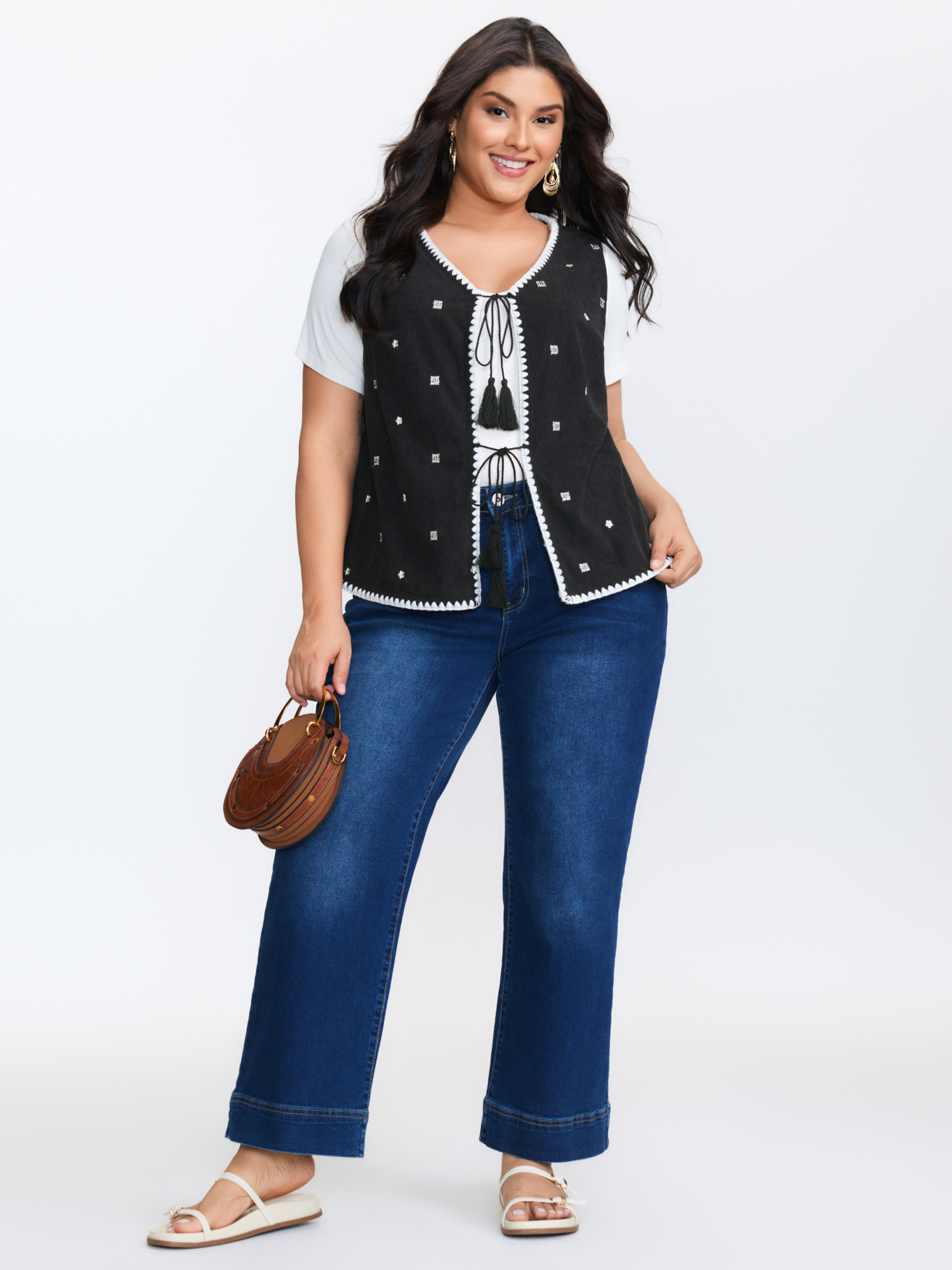 Side view of BloomChic Women's Plus Size Floral Embroidered Tassel-Front Vest Black Lace-Up 28/5X