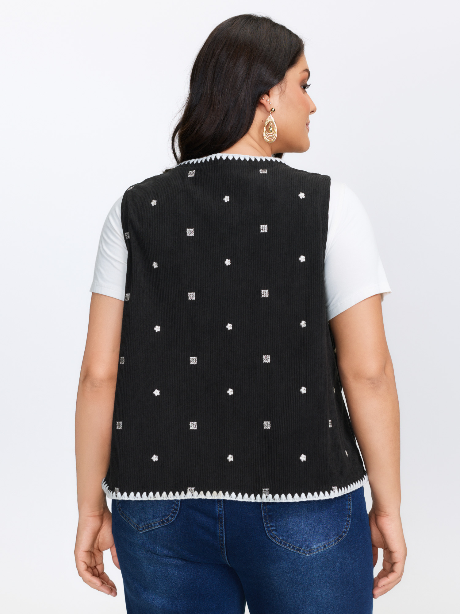 Side view of BloomChic Women's Plus Size Floral Embroidered Tassel-Front Vest Black Lace-Up 28/5X