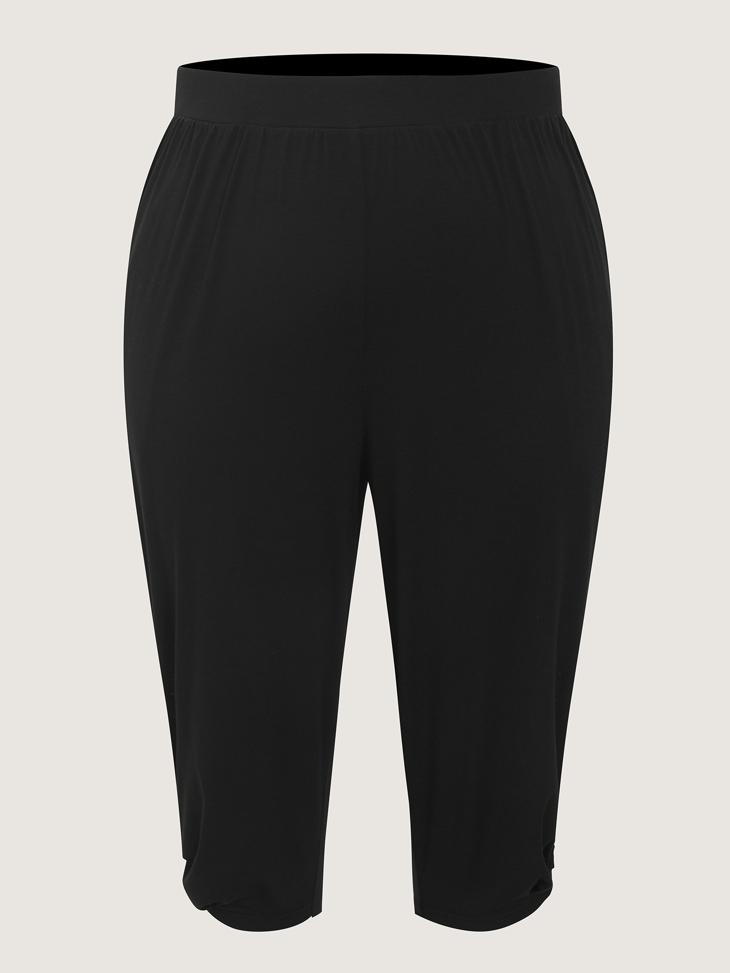 Side view of BloomChic Women's Plus Size Supersoft Stretchy Cuffed Cropped Lounge Bottoms Black Capri 14-16/1X