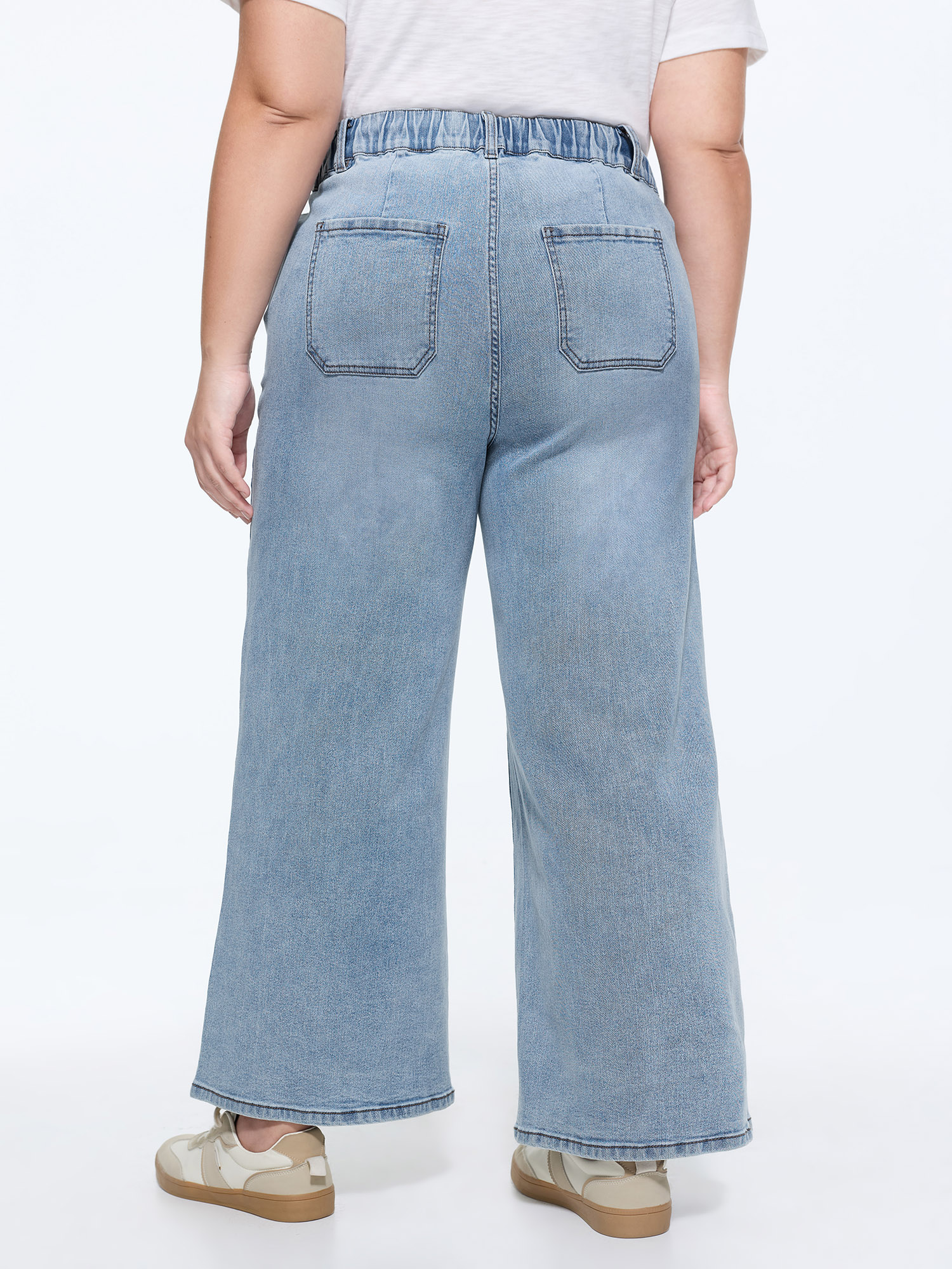 Side view of BloomChic Women's Plus Size Stretchy Elastic Waistband Seamed Jeans Denimlightblue Wide leg Medium stretch 30/6X