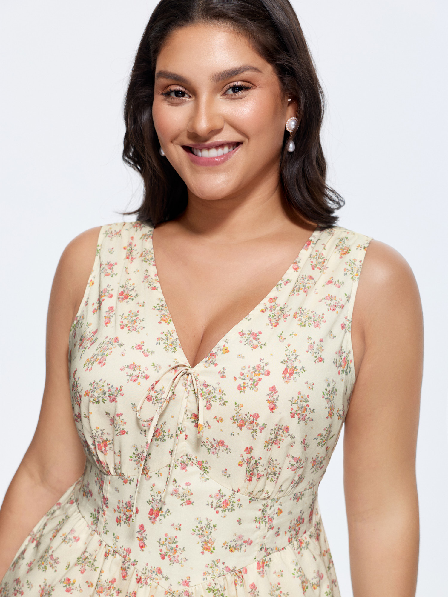 Side view of BloomChic Women's Plus Size Sweet Floral Print Cinched-Waist Midi Dress Beige Ditsy Floral Maxi Elegant Smocked 30/6X