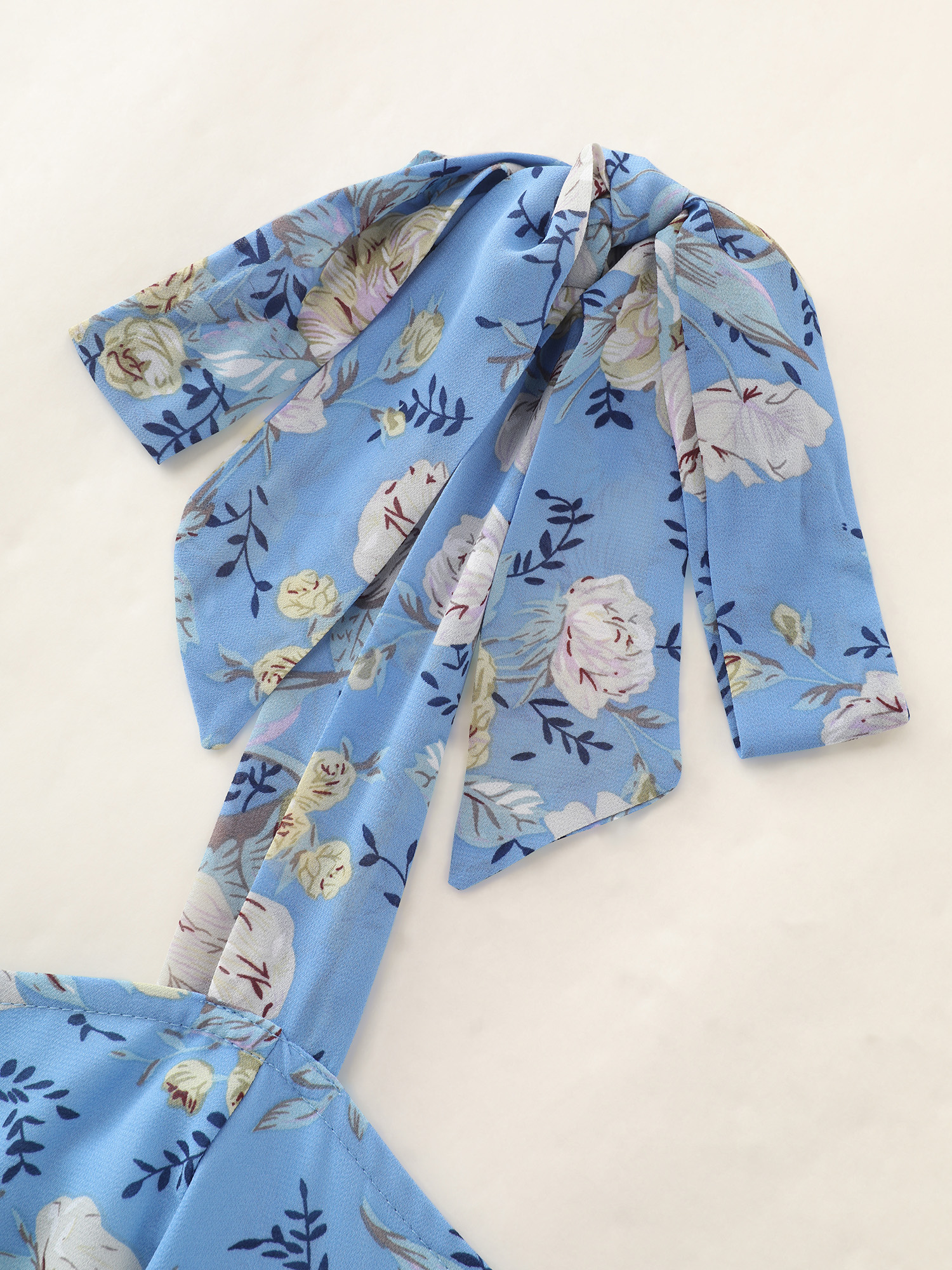 Side view of BloomChic Women's Plus Size Floral Print Shoulder-Tie Flowy Maxi Dress Skyblue Party Maxi Lace-Up Square Neck 18-20/2X
