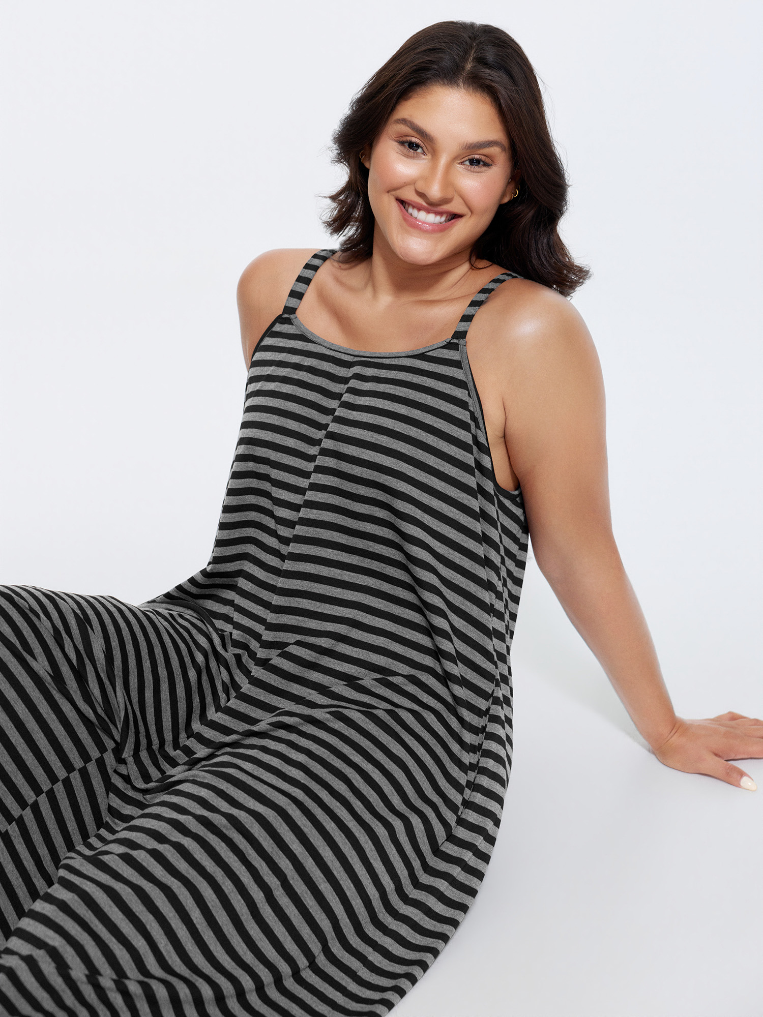 Side view of BloomChic Women's Plus Size Striped Print Relaxed-Fit Cami Jumpsuit DimGray Casual 30/6X