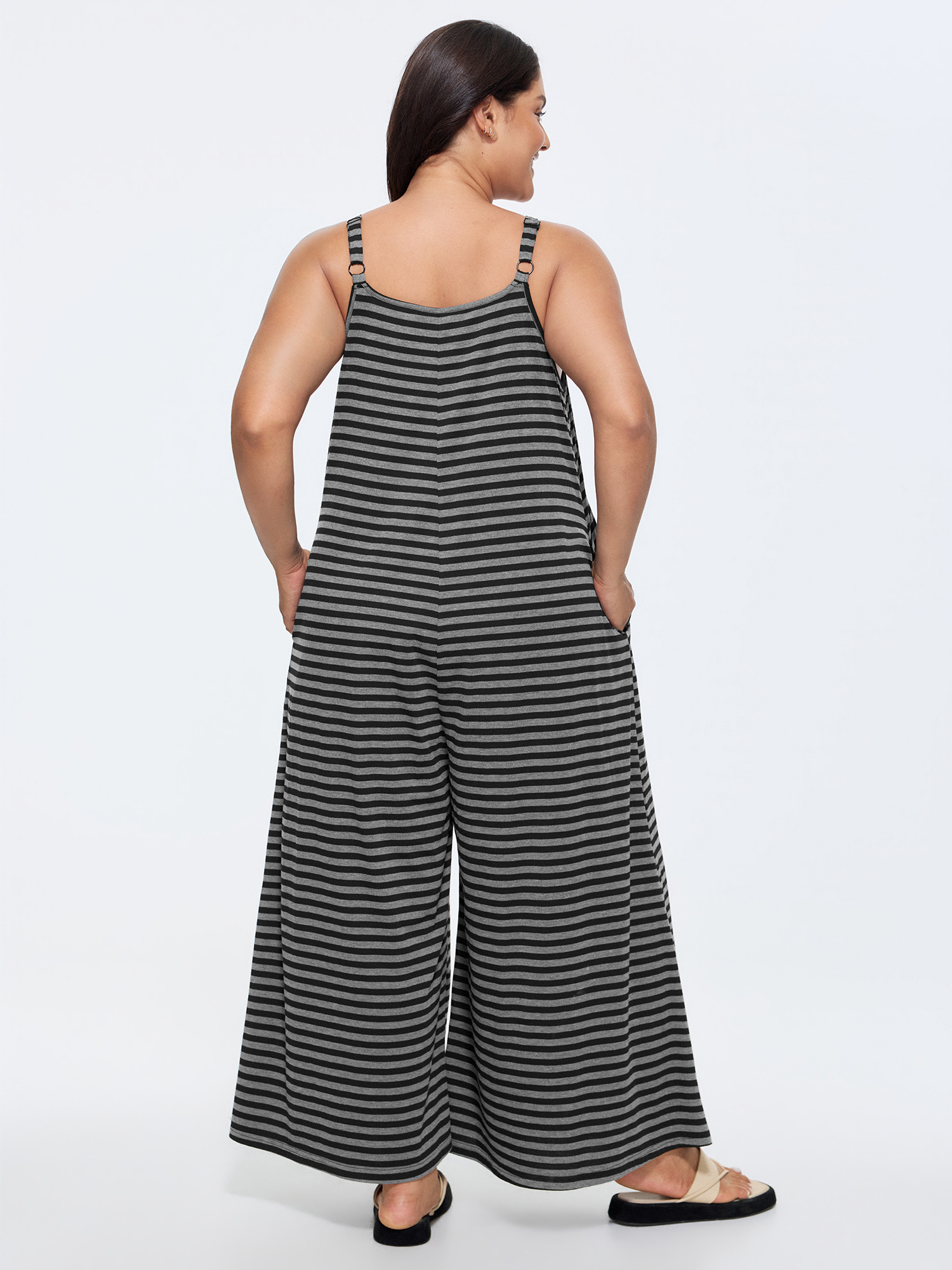Side view of BloomChic Women's Plus Size Striped Print Relaxed-Fit Cami Jumpsuit DimGray Casual 30/6X
