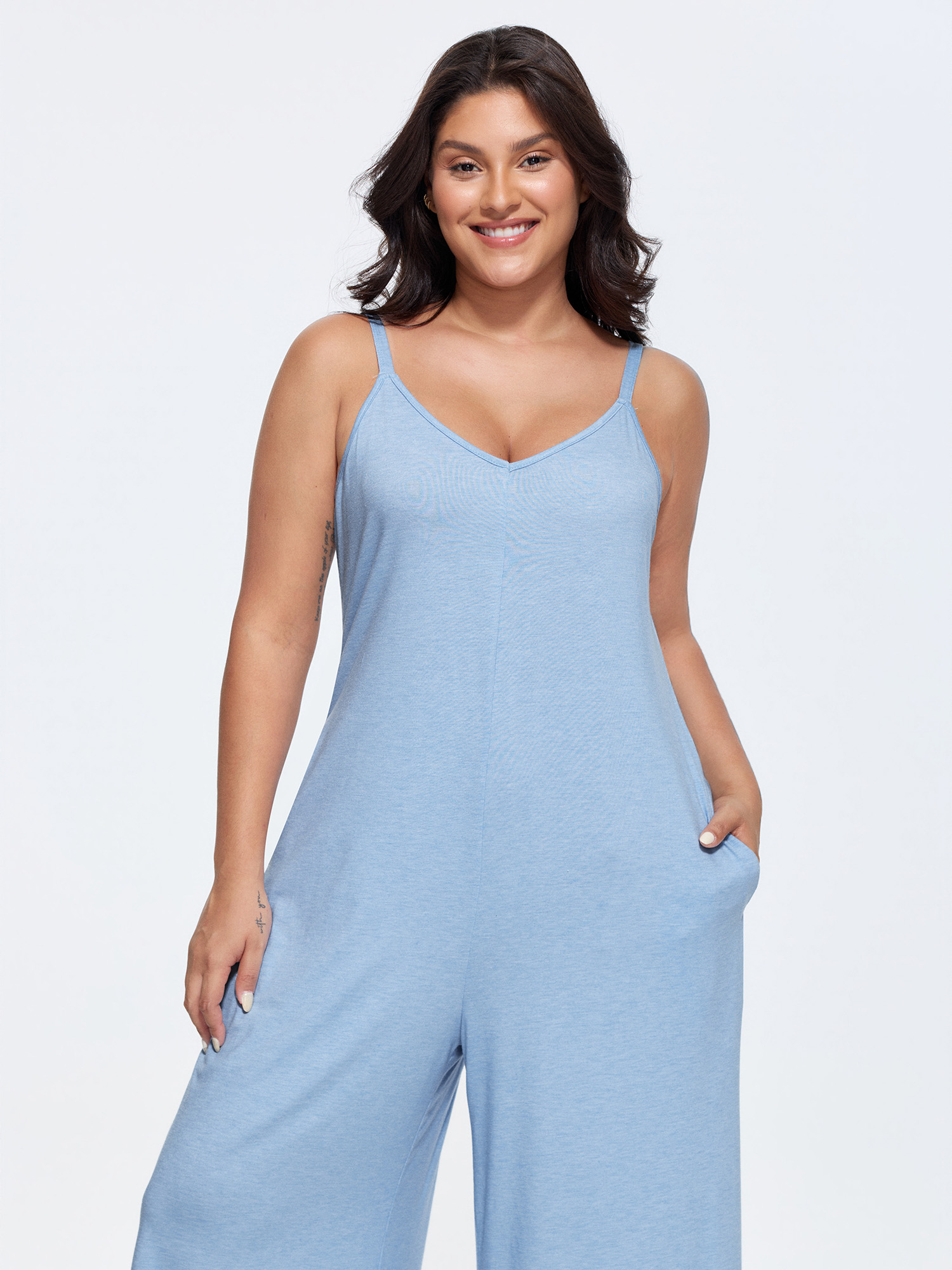 Side view of BloomChic Women's Plus Size Supersoft Stretchy Cami Straight-Leg Lounge Jumpsuit LightBlue not graphics 12/L