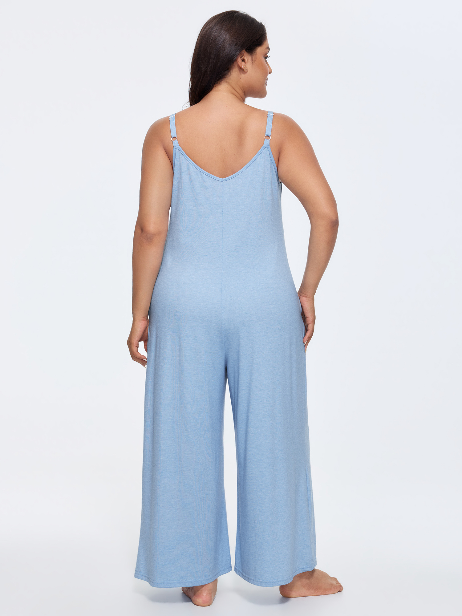 Side view of BloomChic Women's Plus Size Supersoft Stretchy Cami Straight-Leg Lounge Jumpsuit LightBlue not graphics 12/L