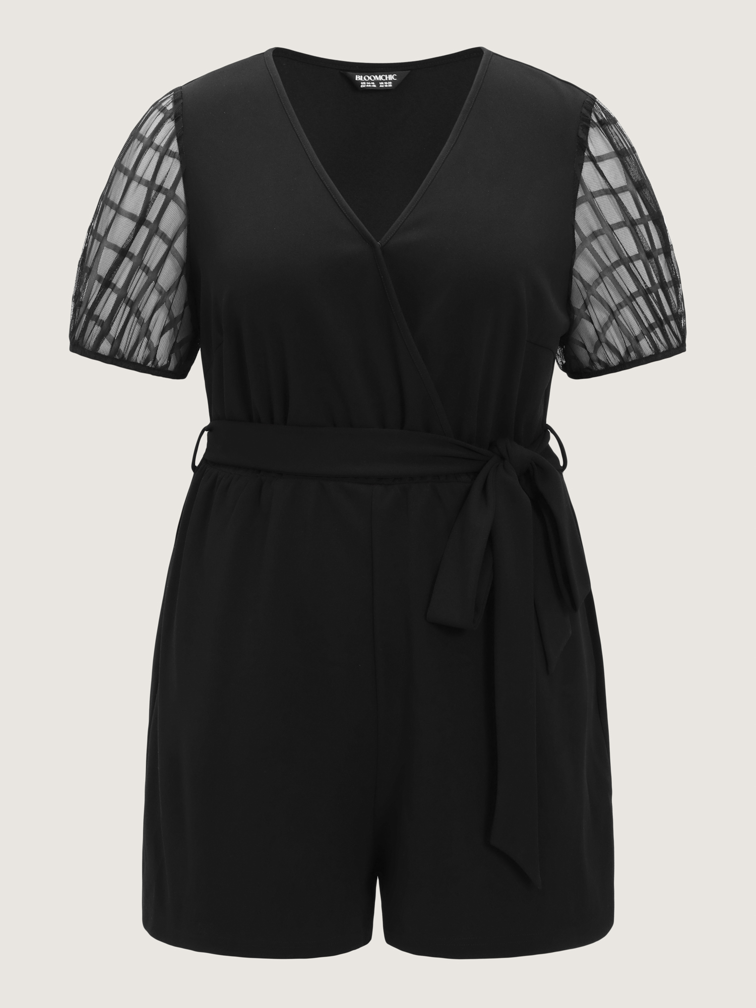 Side view of BloomChic Women's Plus Size Sheer Sleeves Waist-Tie Romper Pureblack Office 14-16/1X