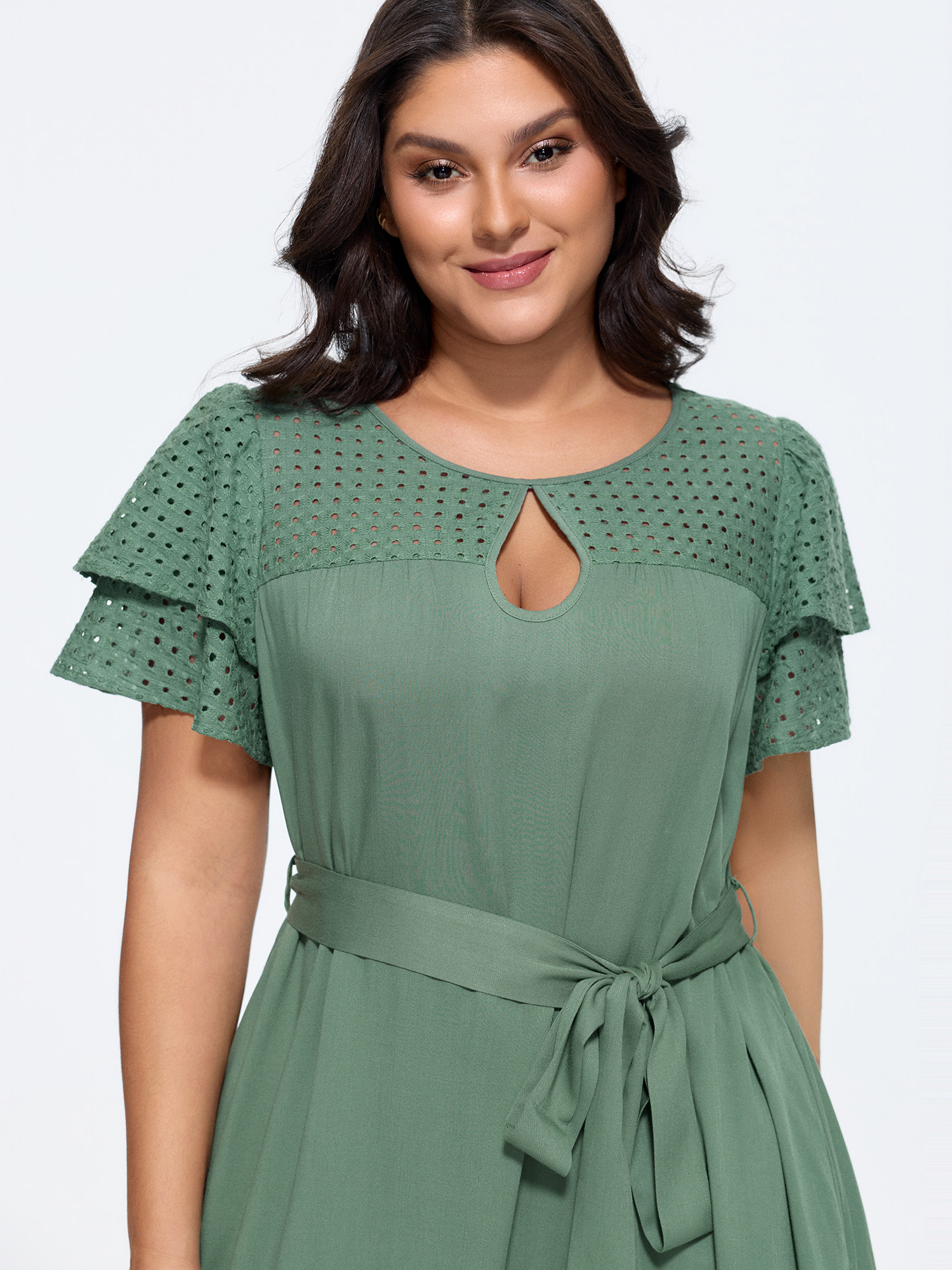 Side view of BloomChic Women's Plus Size Cotton Layered Sleeve Textured Waist-Tie Midi Dress Emerald Solid Knee Length Casual 30/6X