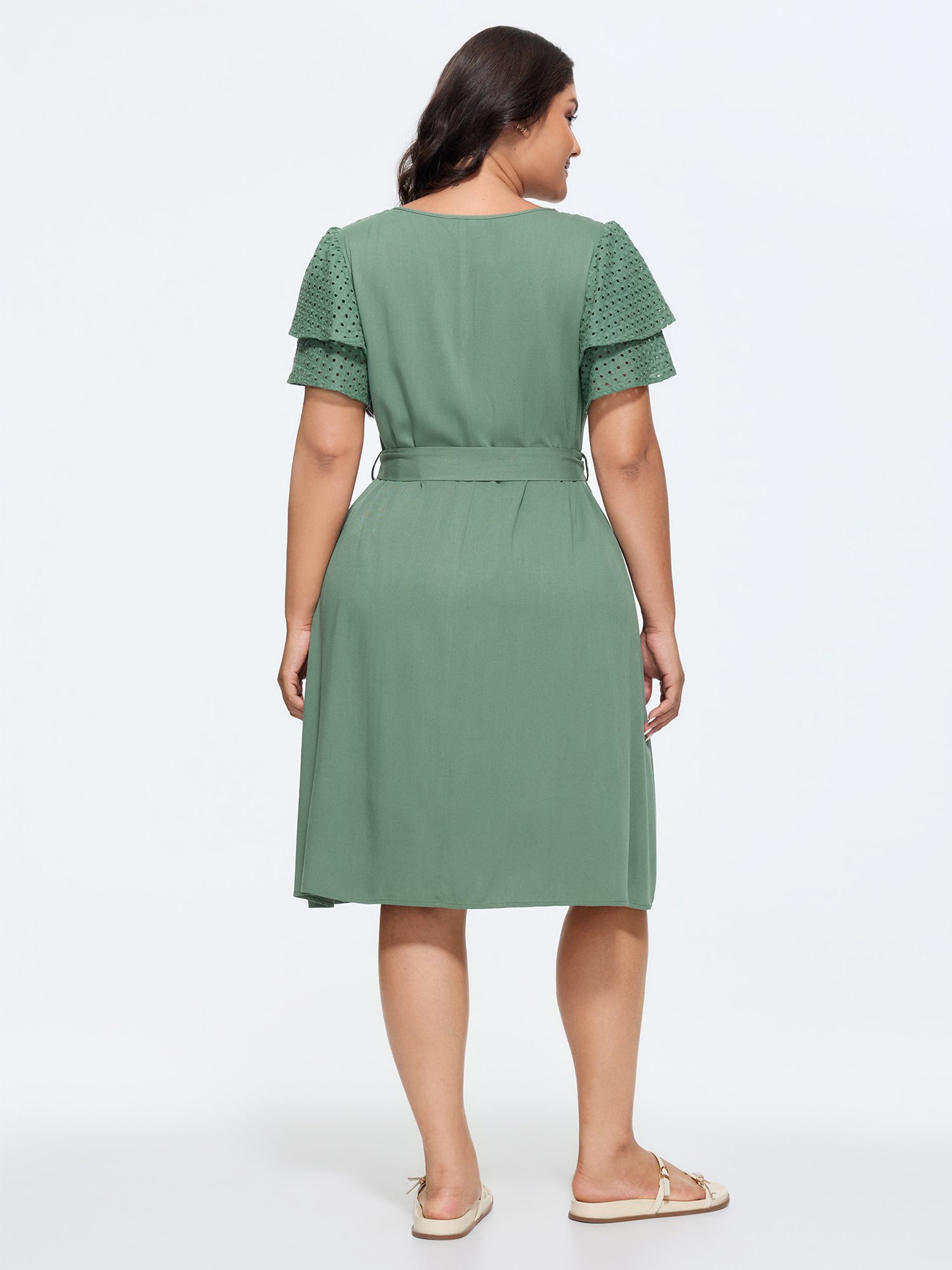 Side view of BloomChic Women's Plus Size Cotton Layered Sleeve Textured Waist-Tie Midi Dress Emerald Solid Knee Length Casual 30/6X