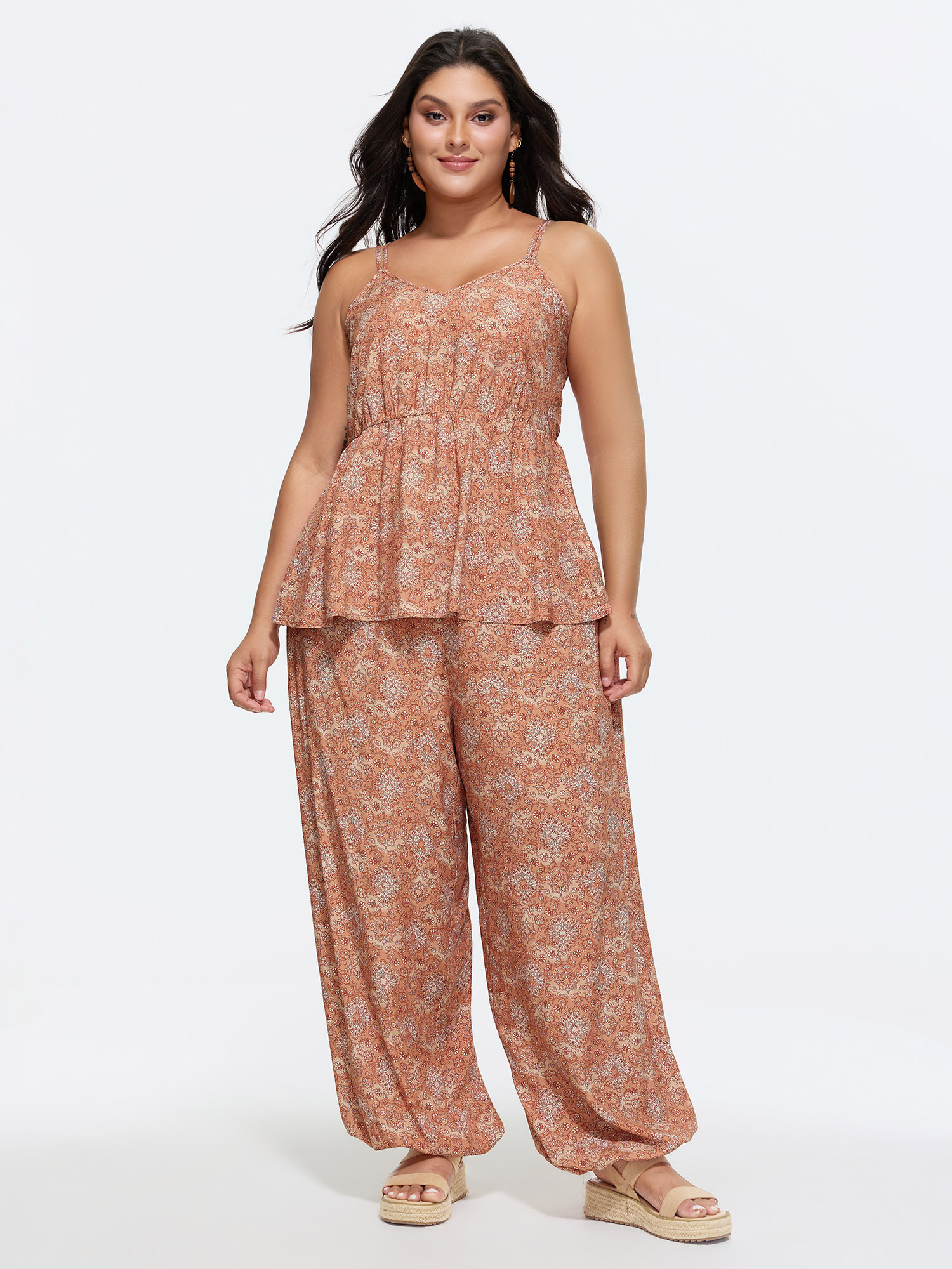 Side view of BloomChic Women's Plus Size Boho Floral Print Elastic Waist Harem Pants Lightorange Ditsy Floral Wide leg Mid Rise Vacation 30/6X
