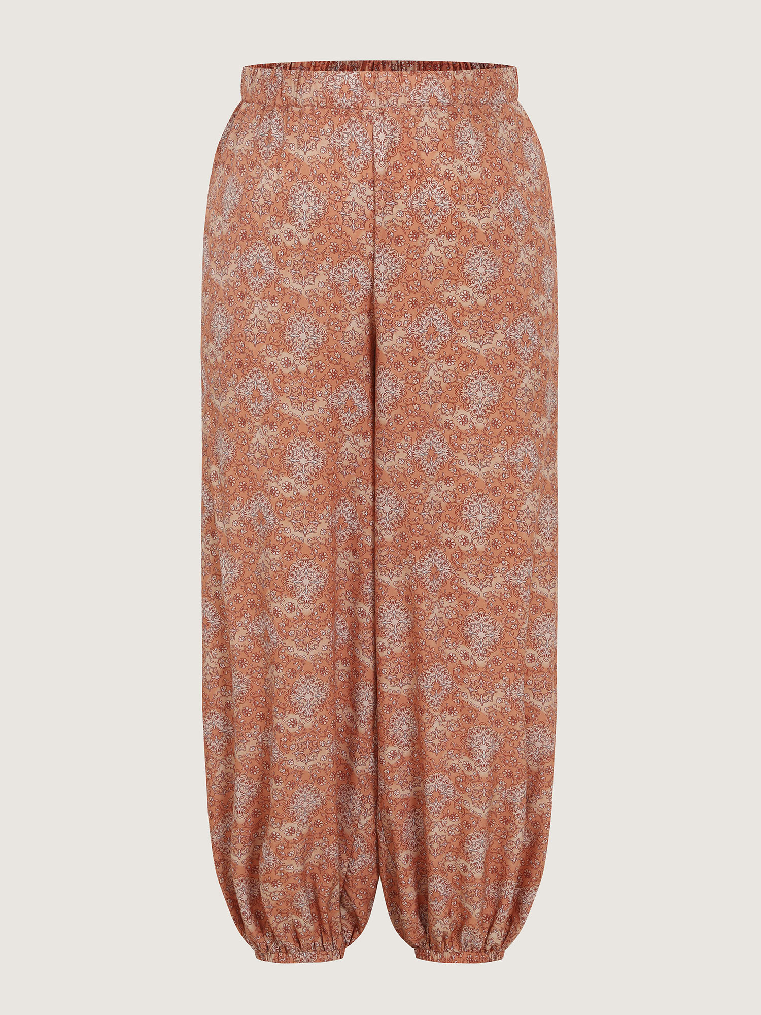 Side view of BloomChic Women's Plus Size Boho Floral Print Elastic Waist Harem Pants Lightorange Ditsy Floral Wide leg Mid Rise Vacation 30/6X