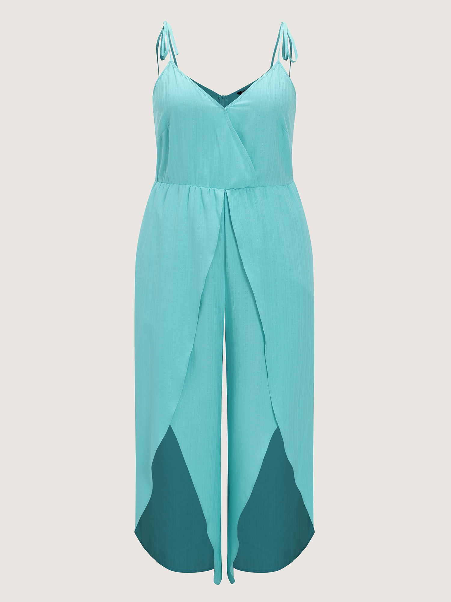 Side view of BloomChic Women's Plus Size Elastic Waist Petal Split Hem Jumpsuit Arctic Vacation 26/4X