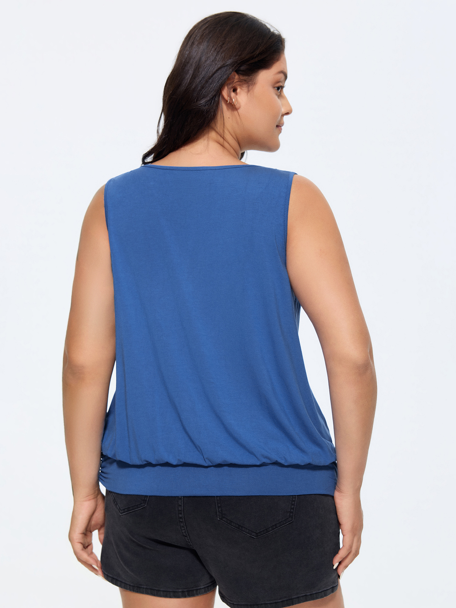 Side view of BloomChic Women's Plus Size Supersoft Overlap Stretchy Hem Tank Top Mediumblue Casual Cocoon V-Neck 30/6X