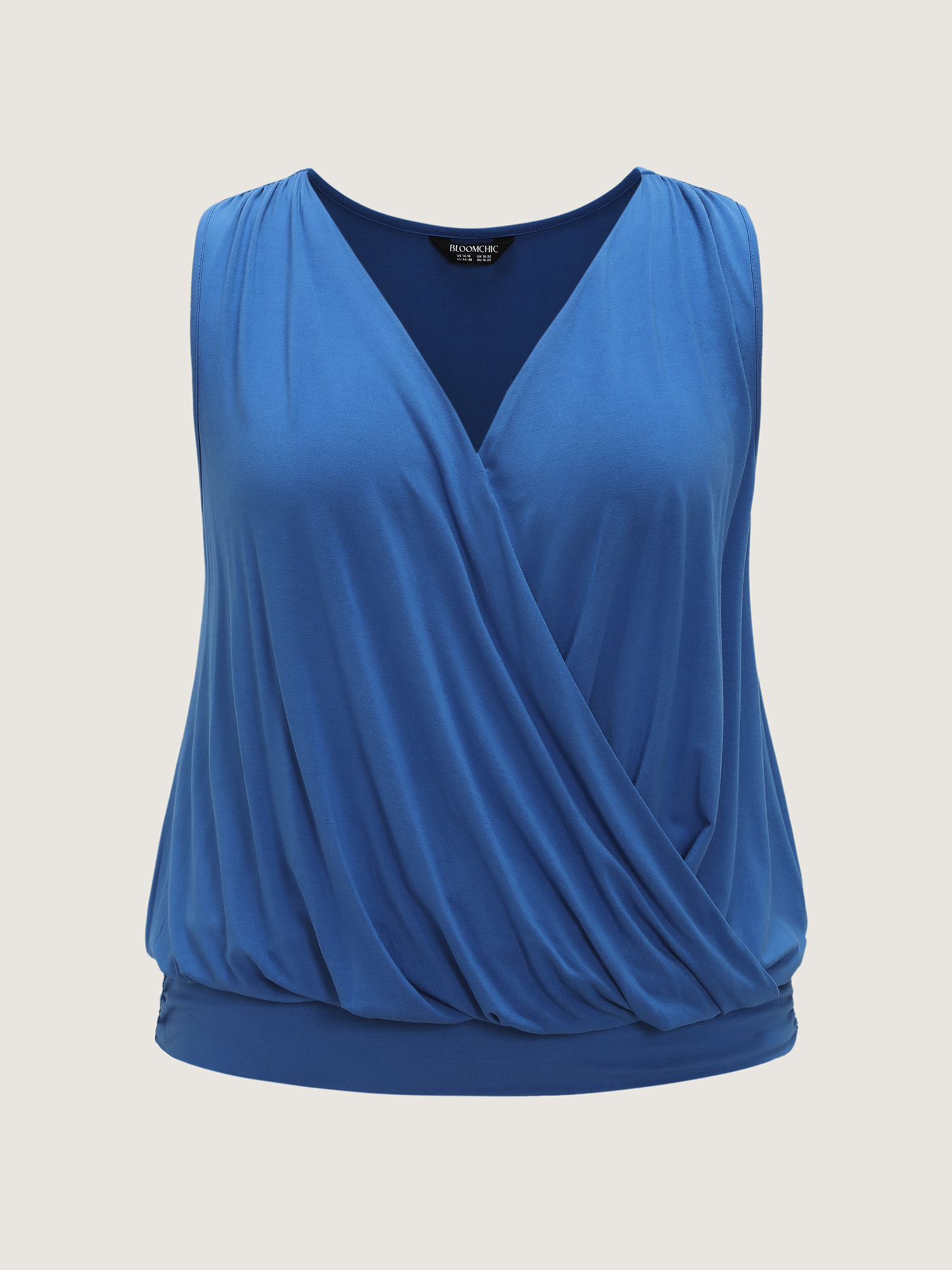Side view of BloomChic Women's Plus Size Supersoft Overlap Stretchy Hem Tank Top Mediumblue Casual Cocoon V-Neck 30/6X